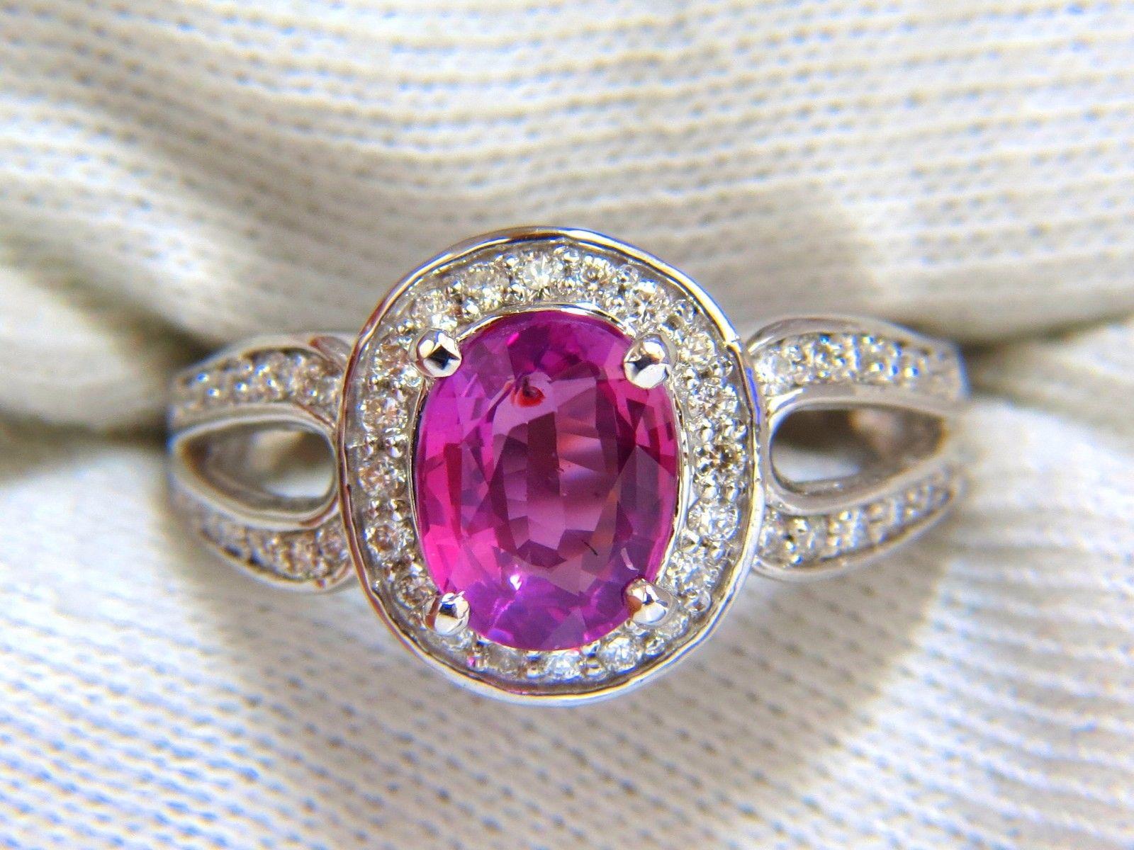 Pink Sapphire & split shank deco

1.98ct. Natural Pink sapphire ring.

Vivid pink color

Clean clarity.

Oval full cut

8.8 X 7mm

Transparent, Vibrant Pink color



.70ct. Side natural round diamonds: 

G-color, Vs-2 clarity.



18kt. white