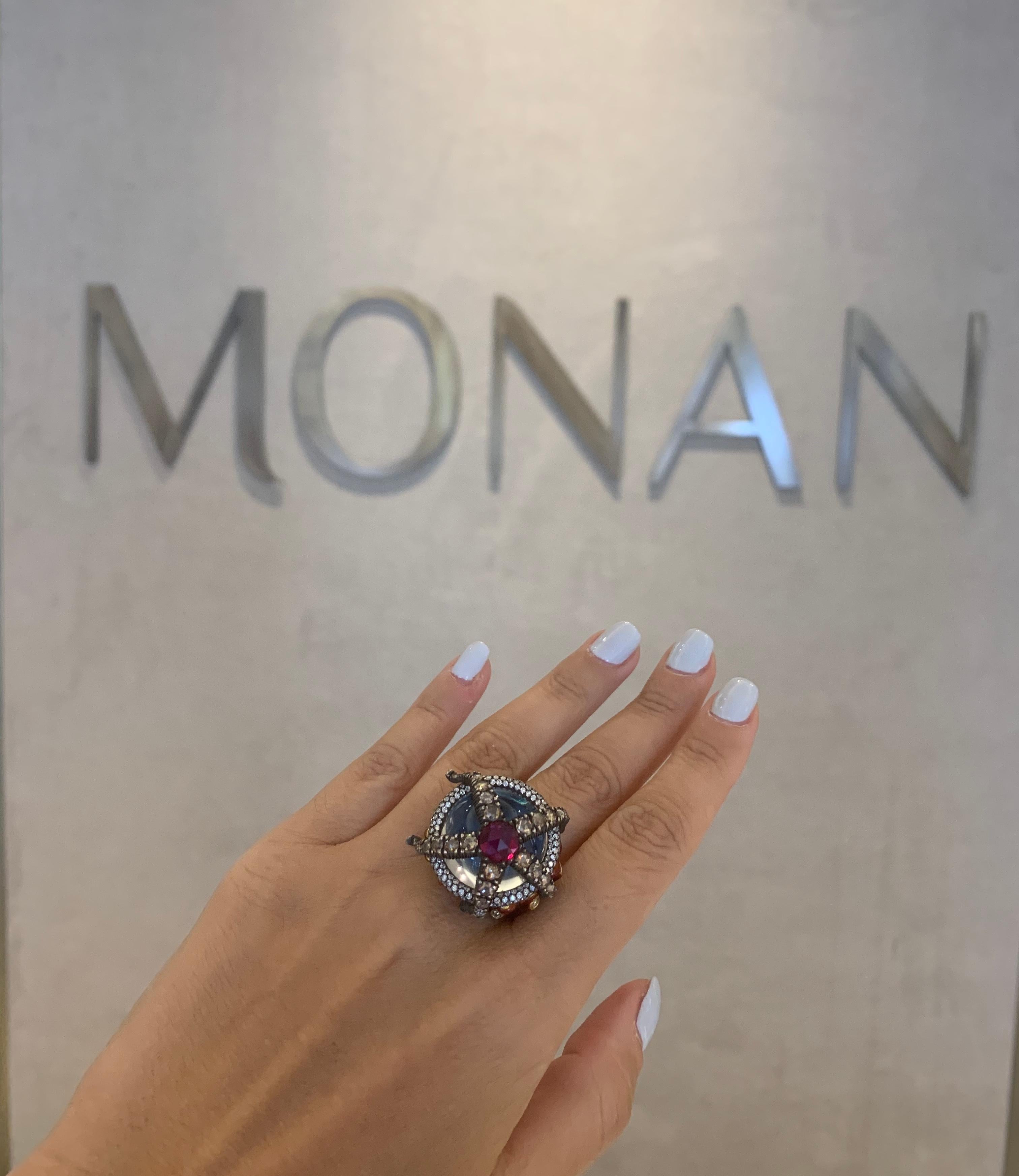 Limited Edition by 2 Starfish Ring from Monan Turquoise Coast Collection with 2.68 ct ruby, 2,20 ct brown and 1,91 ct white diamond set in enameled 18 K gold. Starfish is hanging on rock crystal. You can see the blue enamel part of the ring from the