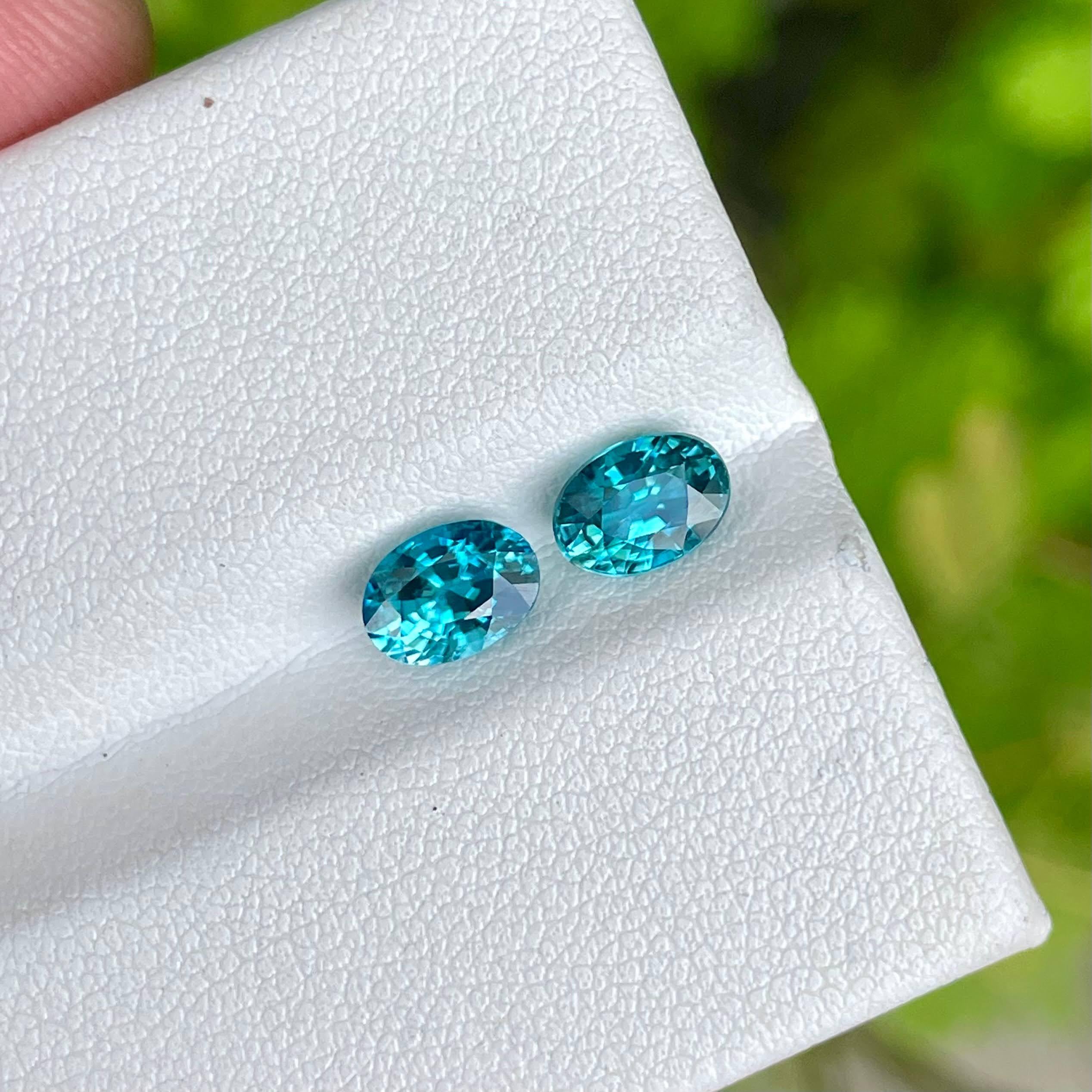 Weight 2.68 carats 
Dimensions 6.75x4.85x4.1 mm 
Treatment Heated 
Origin Cambodia 
Clarity eye clean 
Shape oval 
Cut oval 



Indulge in the captivating allure of the Blue Zircon Stone Pair, a splendid gem that radiates elegance and