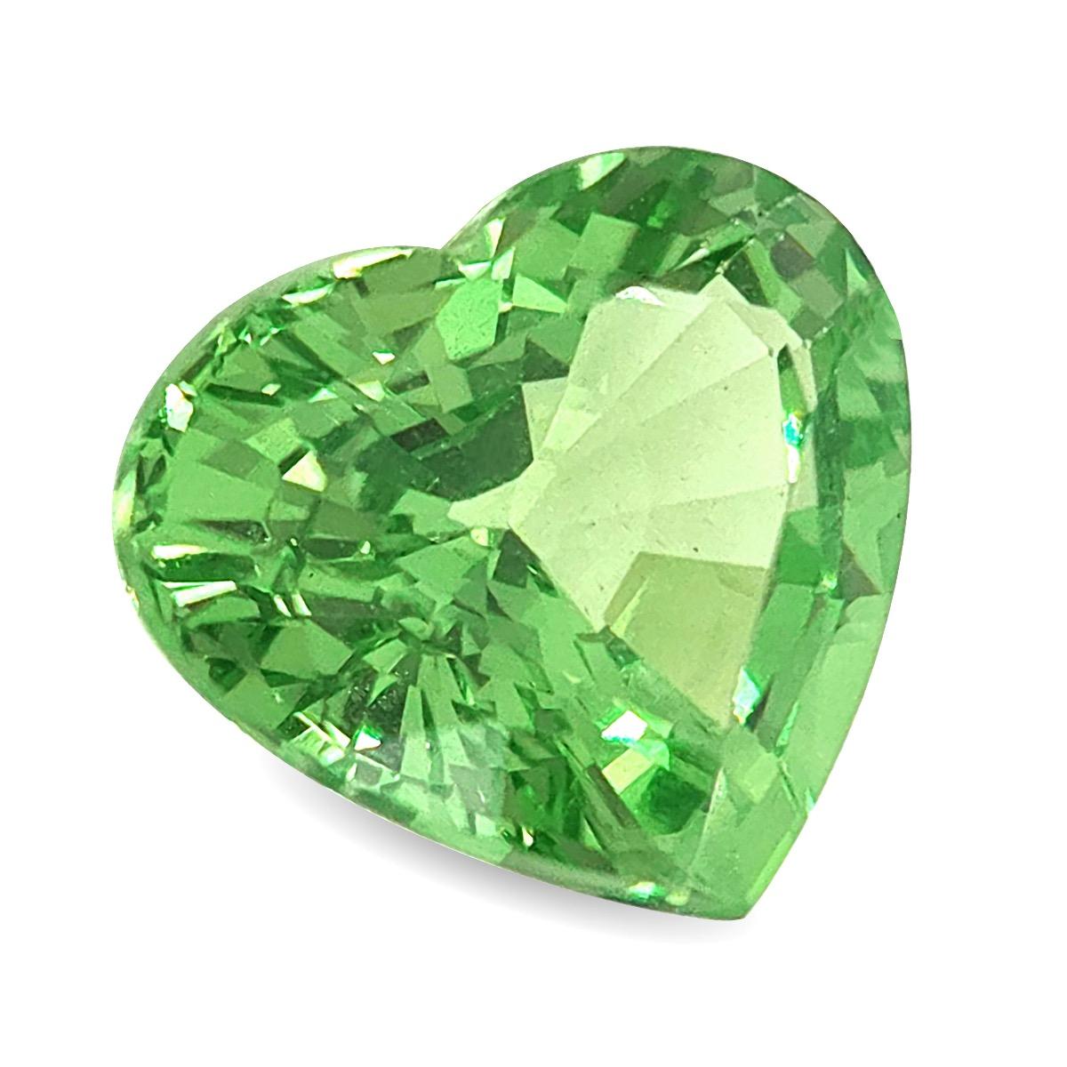 A radiant lime green beams through this stunning heart shaped Tsavorite Garnet. An even yet bold color, this yellowish green gem has been fashioned to perfection, great for a brilliant engagement ring.

Identification: Natural Tsavorite

• Carat:
