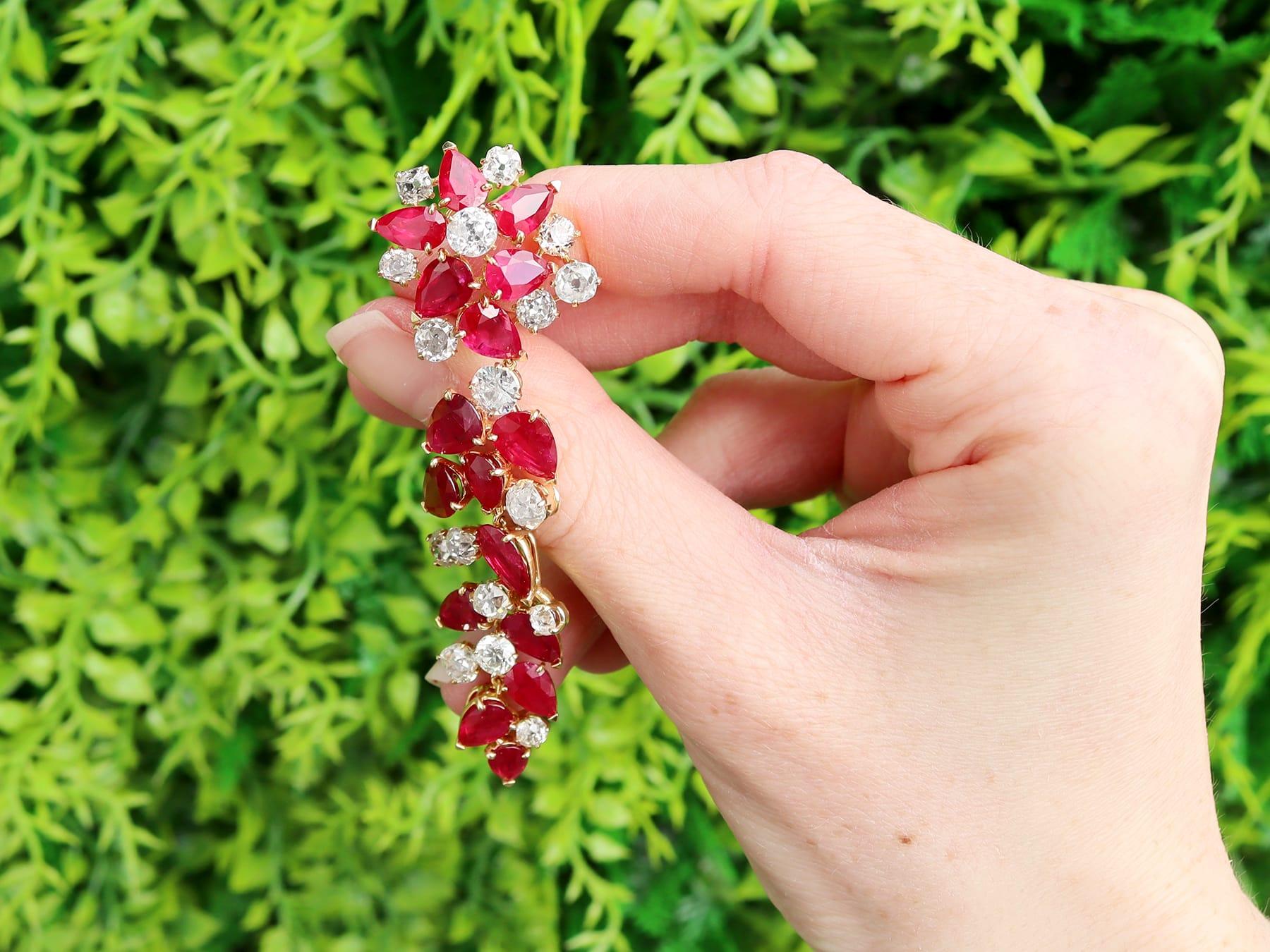 A stunning, fine and impressive pair of 26.80 carat Burmese ruby and 15.50 carat diamond, 18 karat yellow gold chandelier drop earrings; part of our antique ruby jewelry collections.

These stunning, fine and impressive chandelier drop earrings are