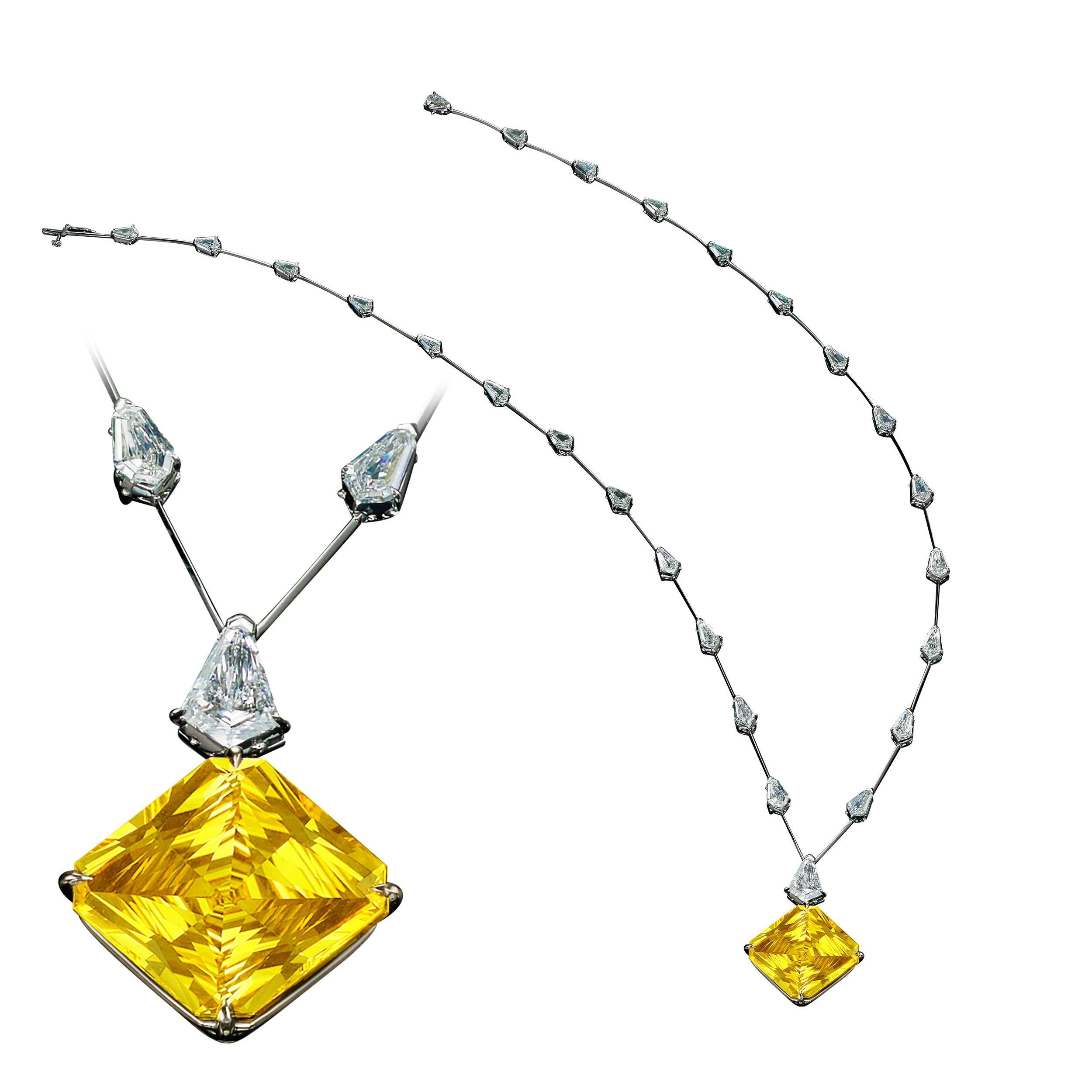 Custom Made 26.86ct Gem Quality No Heat Vivid Yellow Ceylon Emerald Cut Sapphire Necklace.  Set with an extremely unique layout of 9.09ct Fine Quality Kite Diamonds.  Beautifully laid out sapphire, vibrant, super clean stone, golden yellow