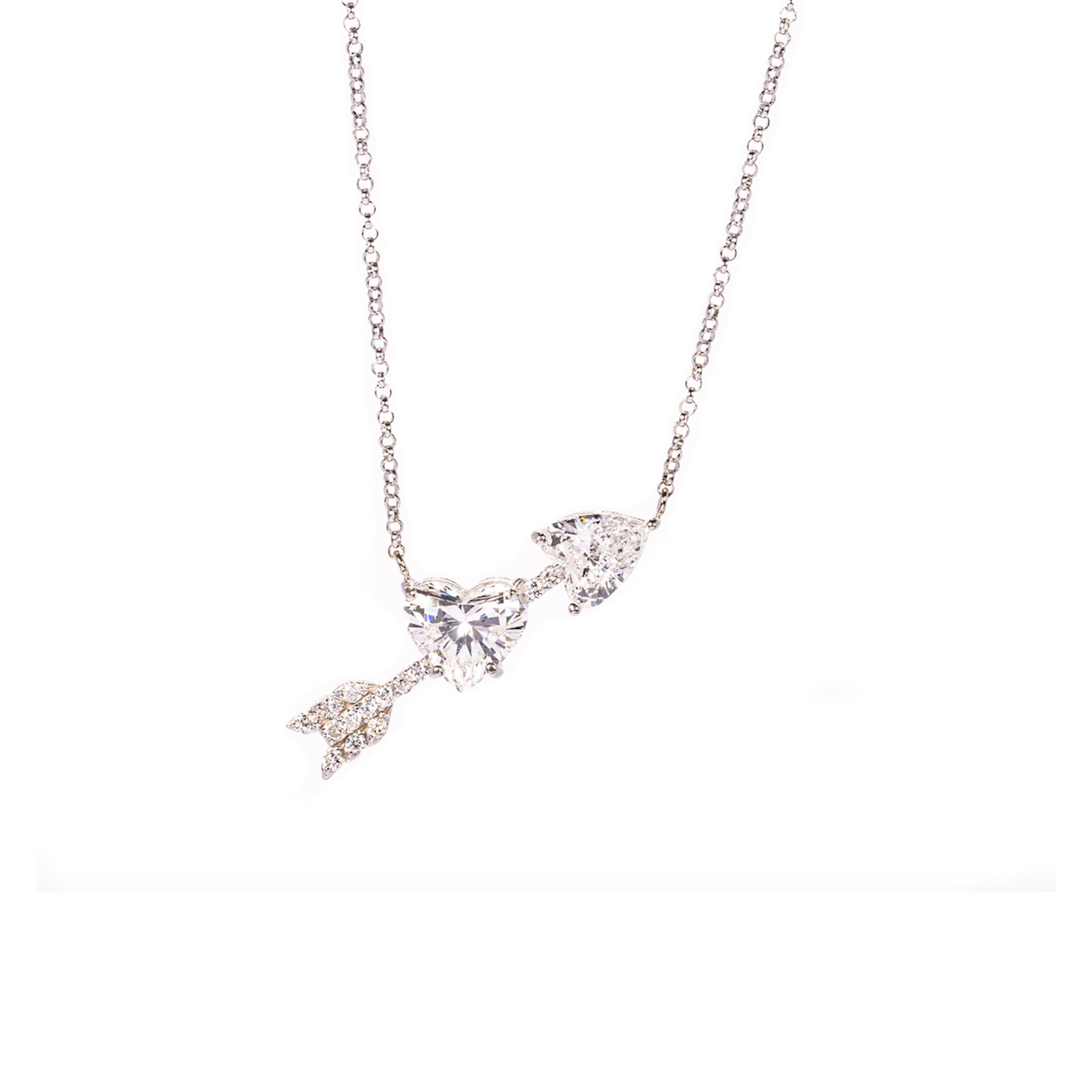 This necklace features a sparkling diamond heart pierced by an arrow, symbolizing love's enduring journey while catching the light from every angle. Perfect for special occasions or everyday wear.

H.S : 1.60ct
H.S : 0.92ct
S. Dia : 0.16ct
Length: