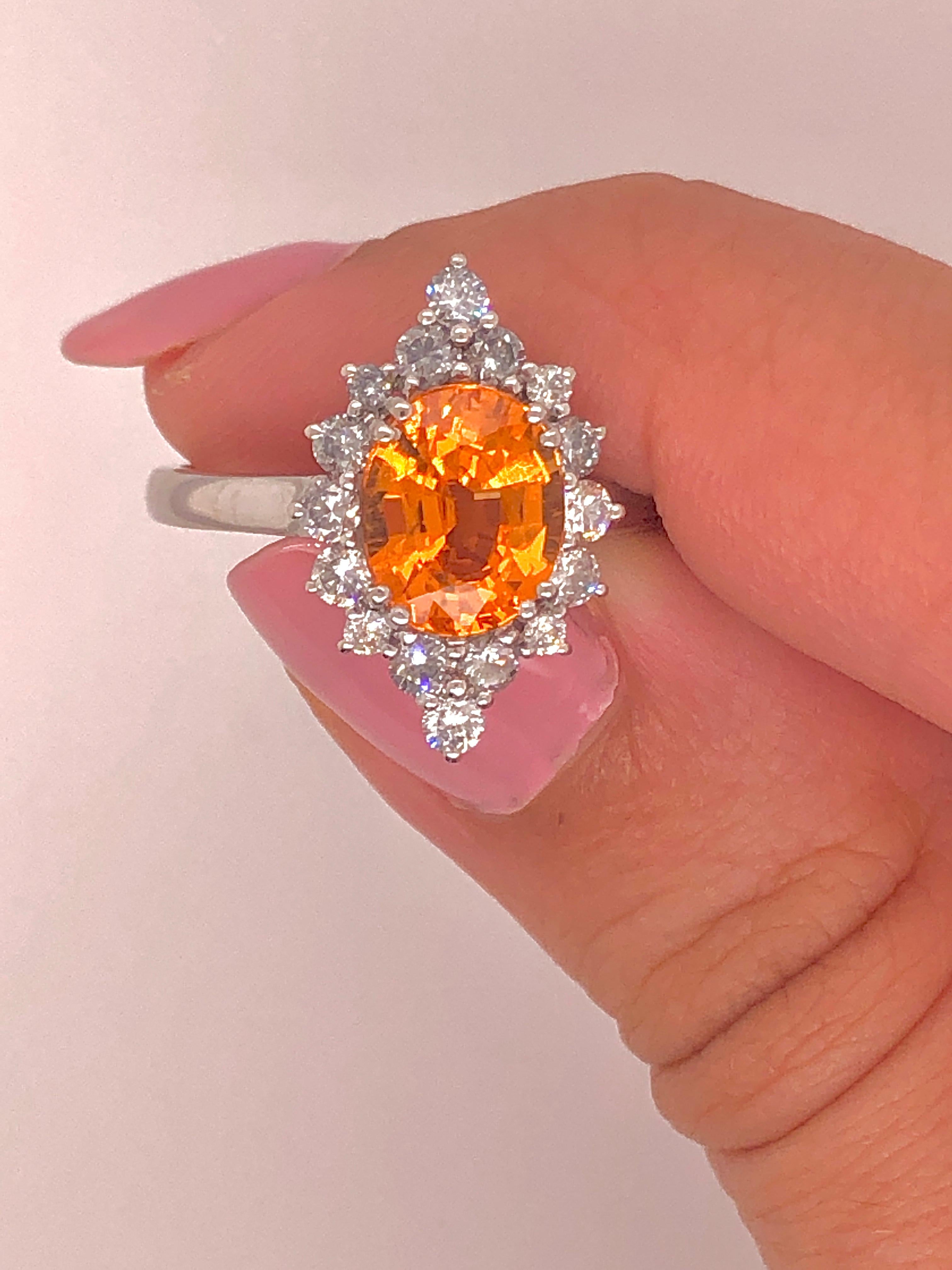 2.68 Carat Fine Orange Spessartine Oval Gem Quality Garnet and Diamond Halo Ring For Sale 2