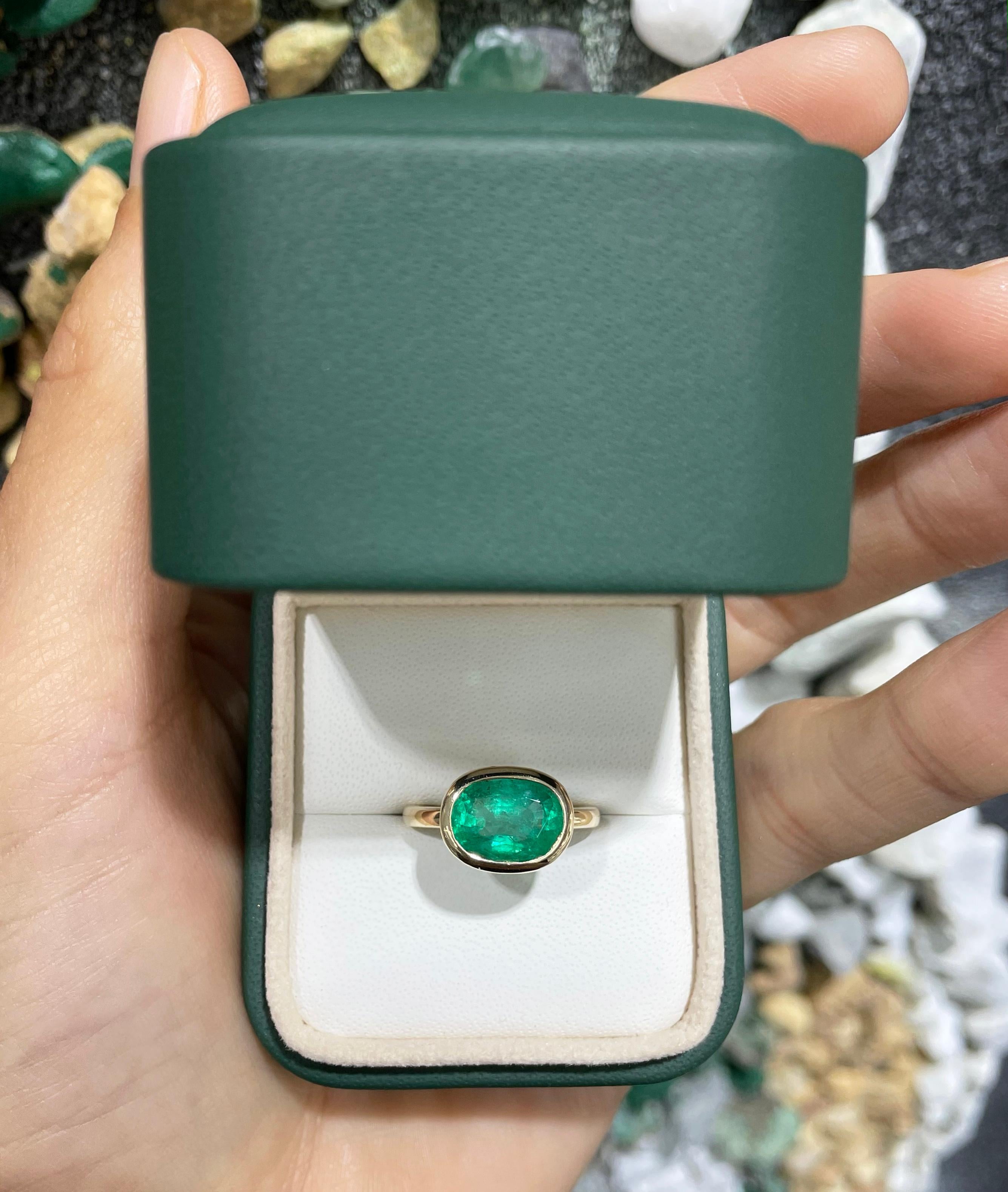 2.68cts 14K Bezel Set Oval Emerald Solitaire East to West Ring In New Condition For Sale In Jupiter, FL
