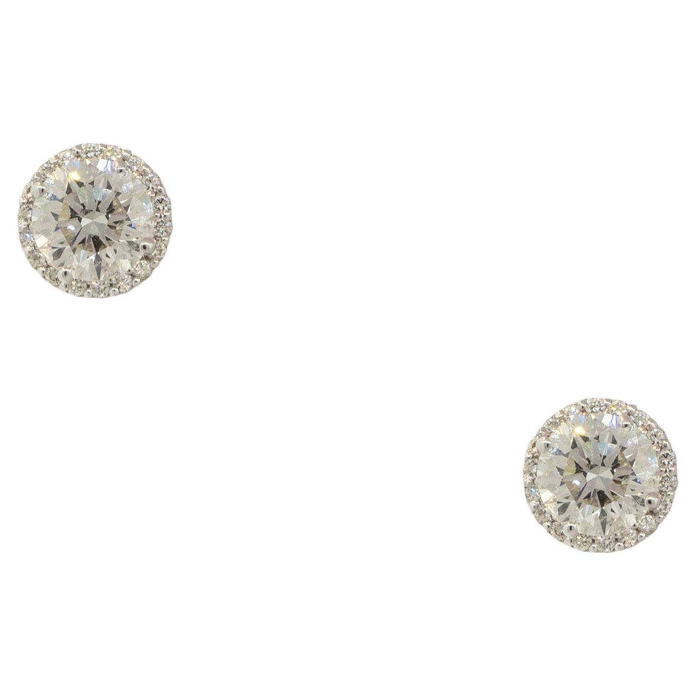2.69 Carat Halo Diamond Stud Earrings 14 Karat In Stock For Sale