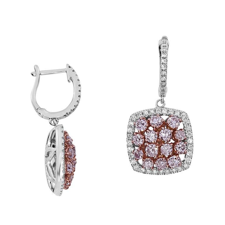 Beautiful classy 2.69 Carat Natural Pink Diamond Earrings by Shimon's Creations. These earrings feature 2.04 Carats of Natural Pink Diamonds and 0.65 Carats of Natural White Diamonds. The White Diamonds are all G-H Color and SI1 Quality. The Natural