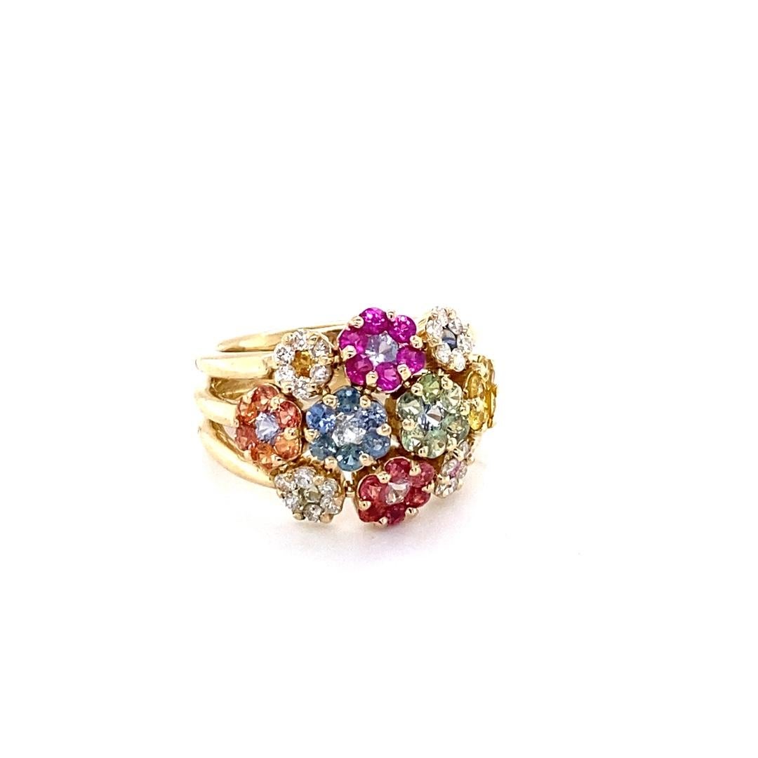 2.69 Carat Natural Sapphire Diamond Yellow Gold Cocktail Ring

A uniquely designed Multi-Colored Sapphire and Diamond Ring that looks like a beautiful bouquet of flowers!!
This ring has 46 Natural Round Cut Multi-Colored Sapphires that weigh 2,31