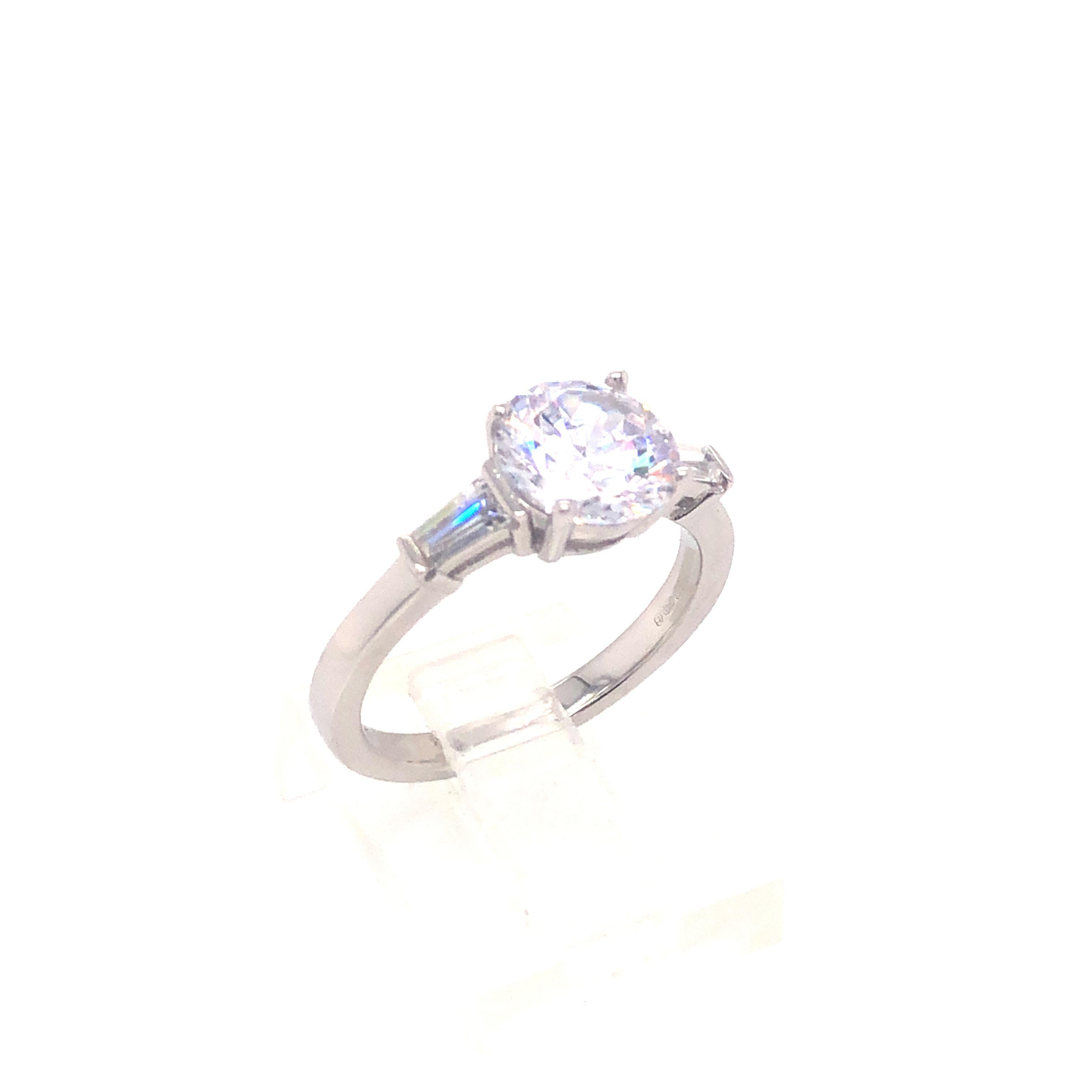 2.69 Carat Solitaire & Tapered Baguette Cubic Zirconia Designer Engagement Ring In New Condition For Sale In London, GB