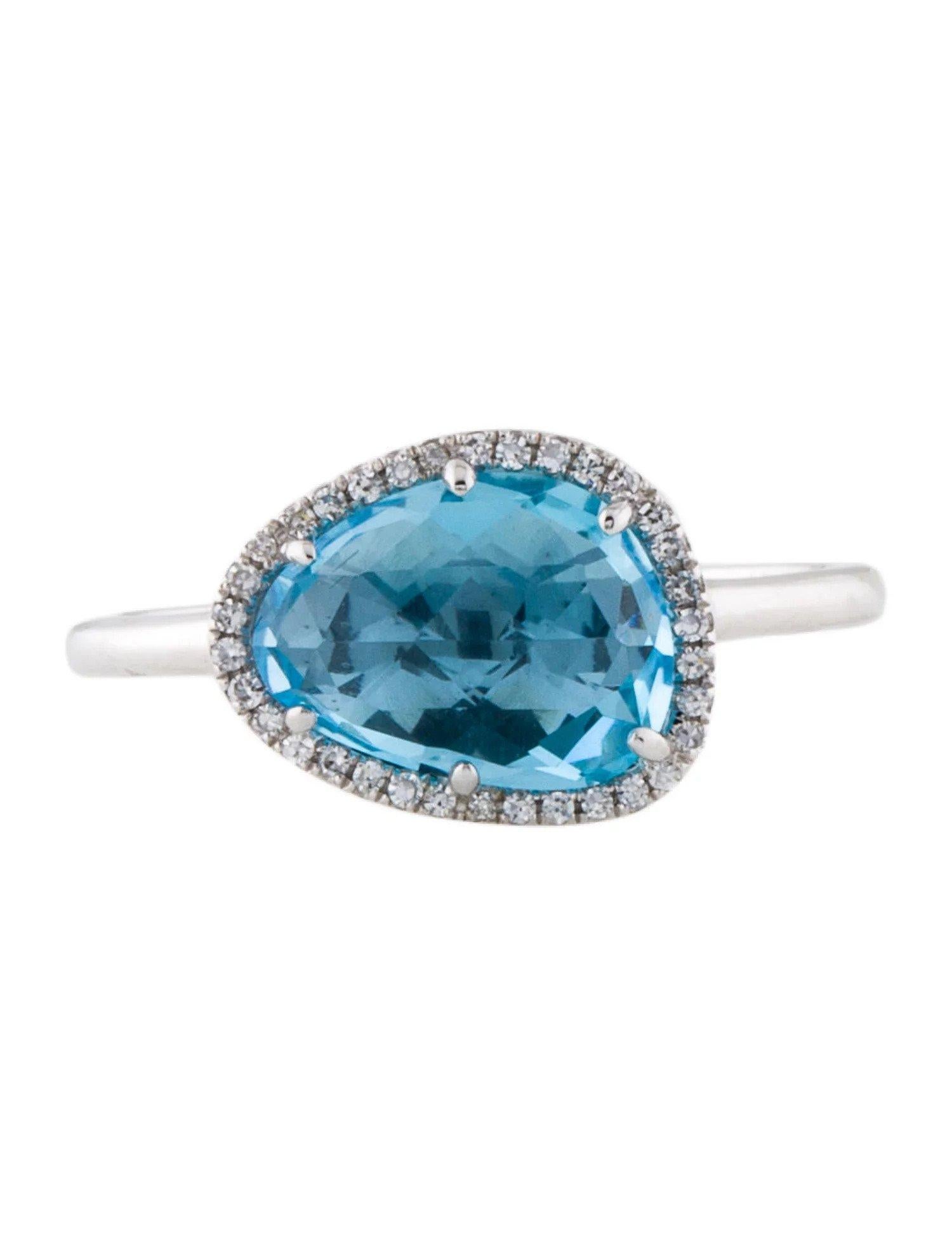 Dieser Schweizer Blautopas- und Diamantring ist ein wunderschönes und zeitloses Accessoire, das jedem Outfit einen Hauch von Glamour und Raffinesse verleiht. 

Dieser Ring besteht aus einem 2,69 Karat Schweizer Blautopas (12 x 9 MM) mit einem