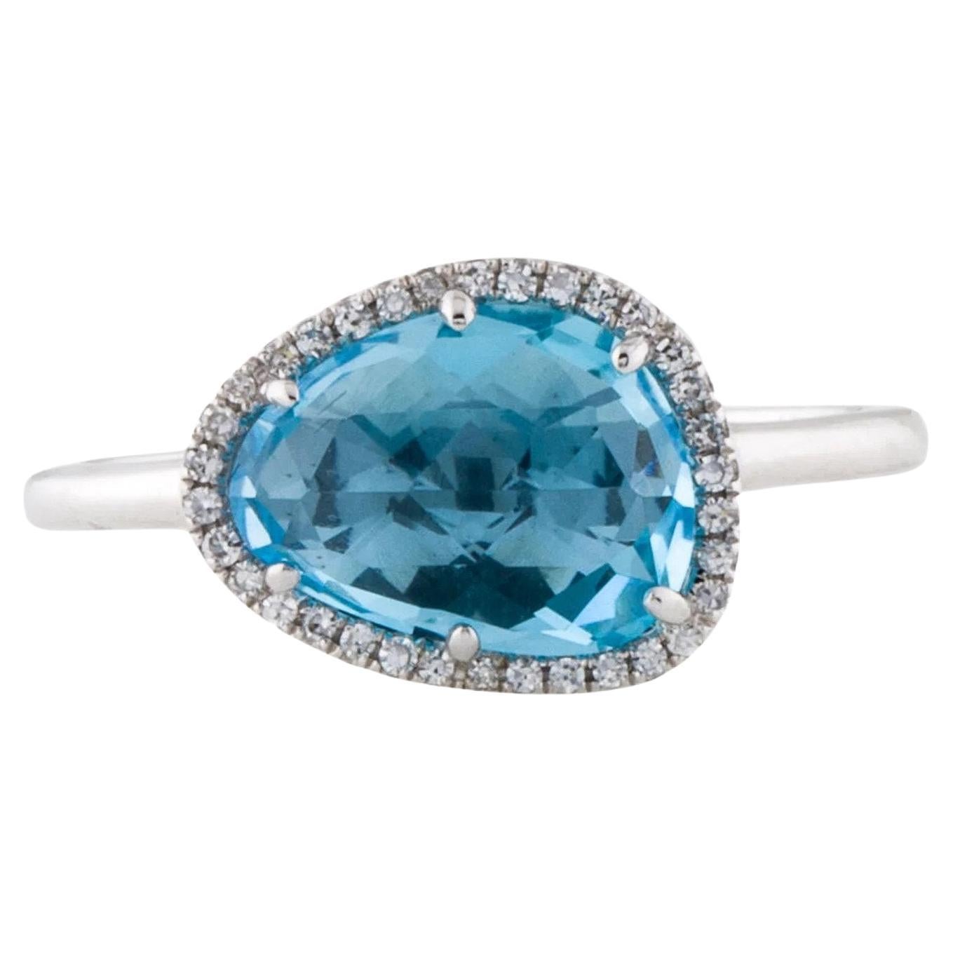 Bague en or blanc avec topaze bleue suisse de 2,69 carats et diamants