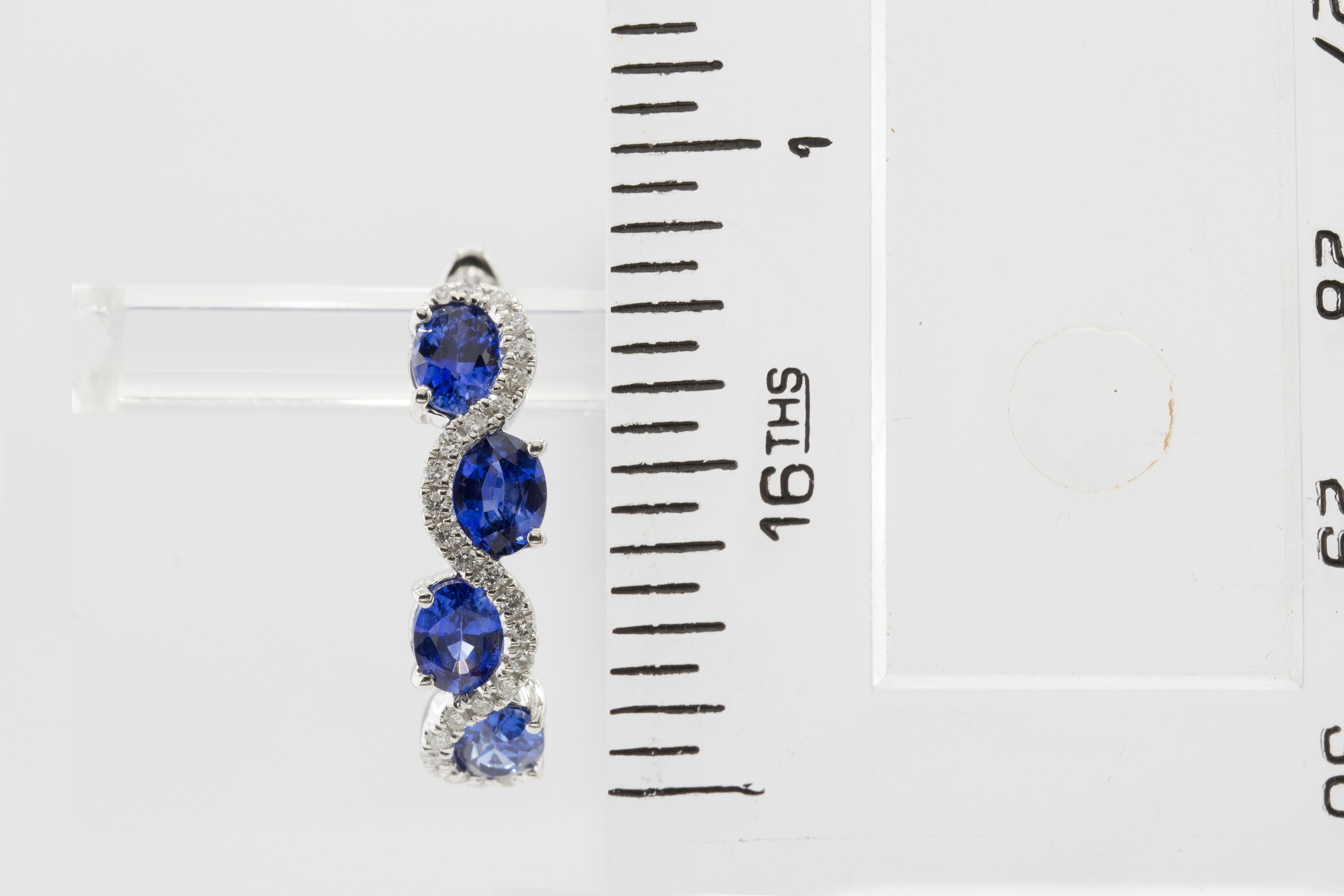 Contemporary 2.69 Carat Vivid Blue Oval Sapphire and Diamond Lever-Back Stud Earrings ref2085 For Sale