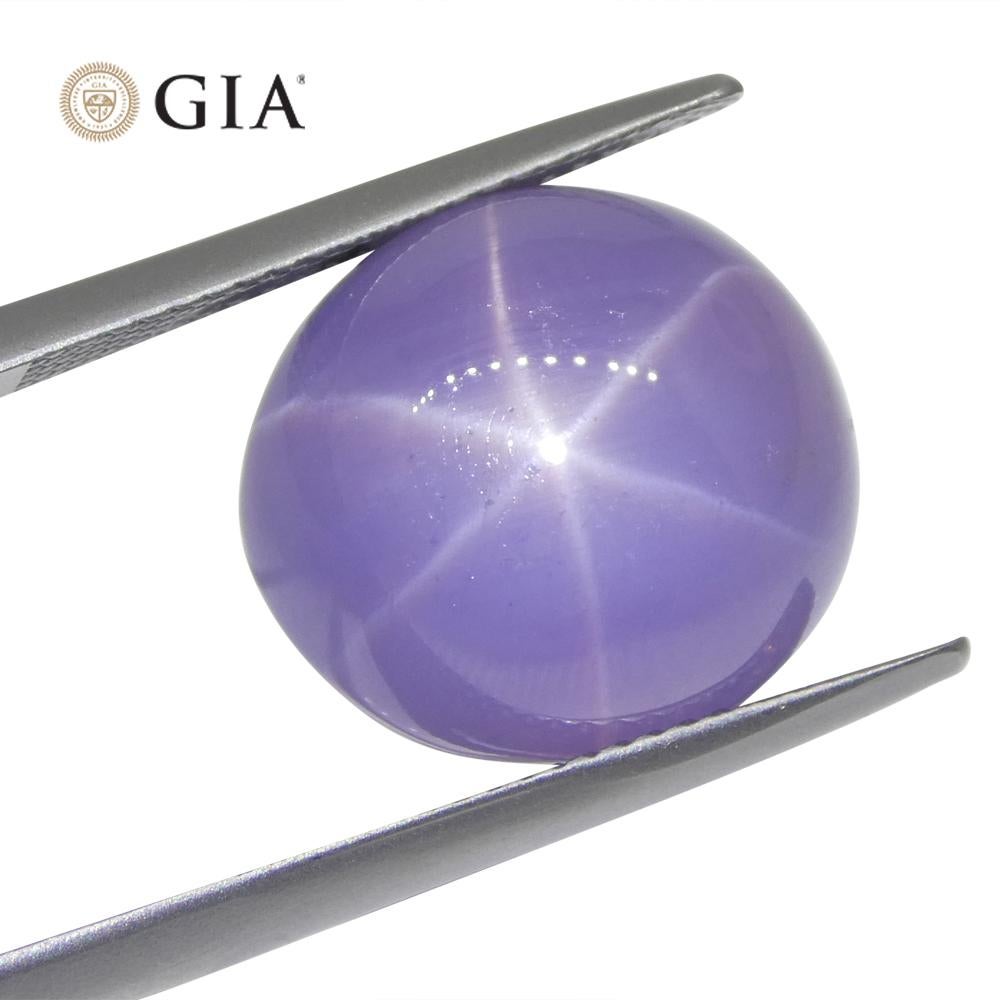 Contemporary 26.92ct Oval Double Cabochon Violetish Blue to Purple Star Sapphire GIA Certifie For Sale