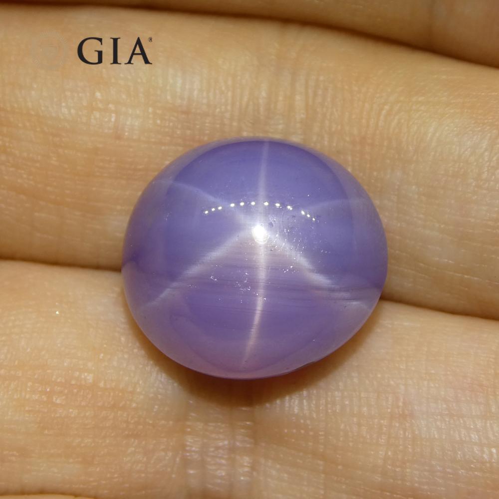26.92ct Oval Double Cabochon Violetish Blue to Purple Star Sapphire GIA Certifie In New Condition For Sale In Toronto, Ontario