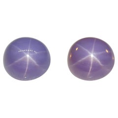 Saphir étoilé bleu violet à violet de 26,92 carats certifié GIA