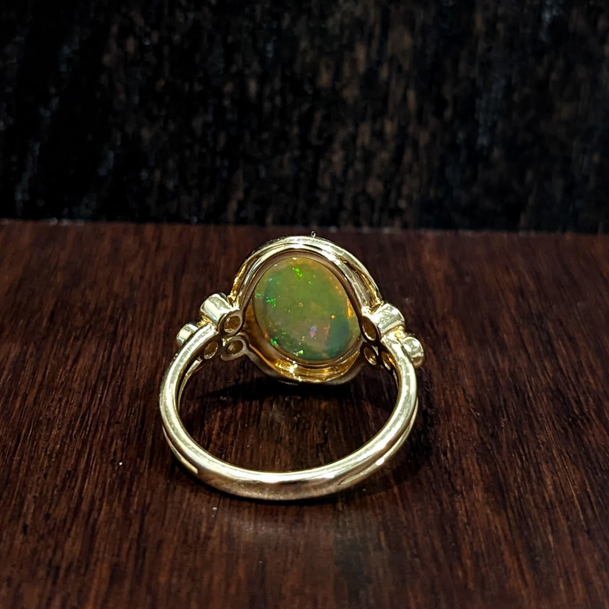 2.6ct Ethiopian Opal Ring w Earth Mined Diamonds in Solid 14k Gold Oval 13x10mm For Sale 1