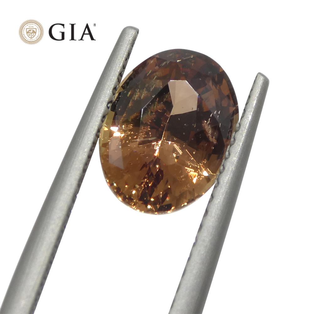 Oval Cut 2.6ct Oval Brownish Pink Sapphire GIA Certified East Africa Unheated For Sale