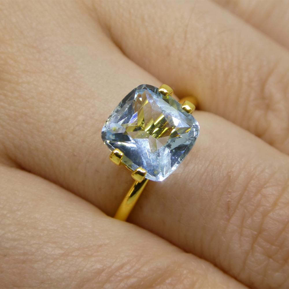 Description:

Gem Type: Aquamarine
Number of Stones: 1
Weight: 2.6 cts
Measurements: 9.10 x 8.66 x 5.24 mm
Shape: Square Cushion
Cutting Style Crown: Brilliant
Cutting Style Pavilion: Brilliant
Transparency: Transparent
Clarity: Slightly Included: