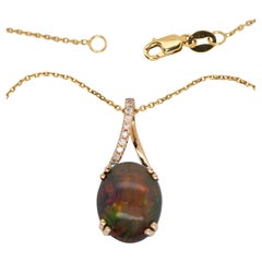2,6cts, 12x10mm - Ciondolo con opale nero etiope e accenti di diamanti in oro 14K