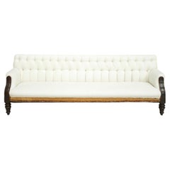2.6m Victorian buttoned back sofa with mahogany frame