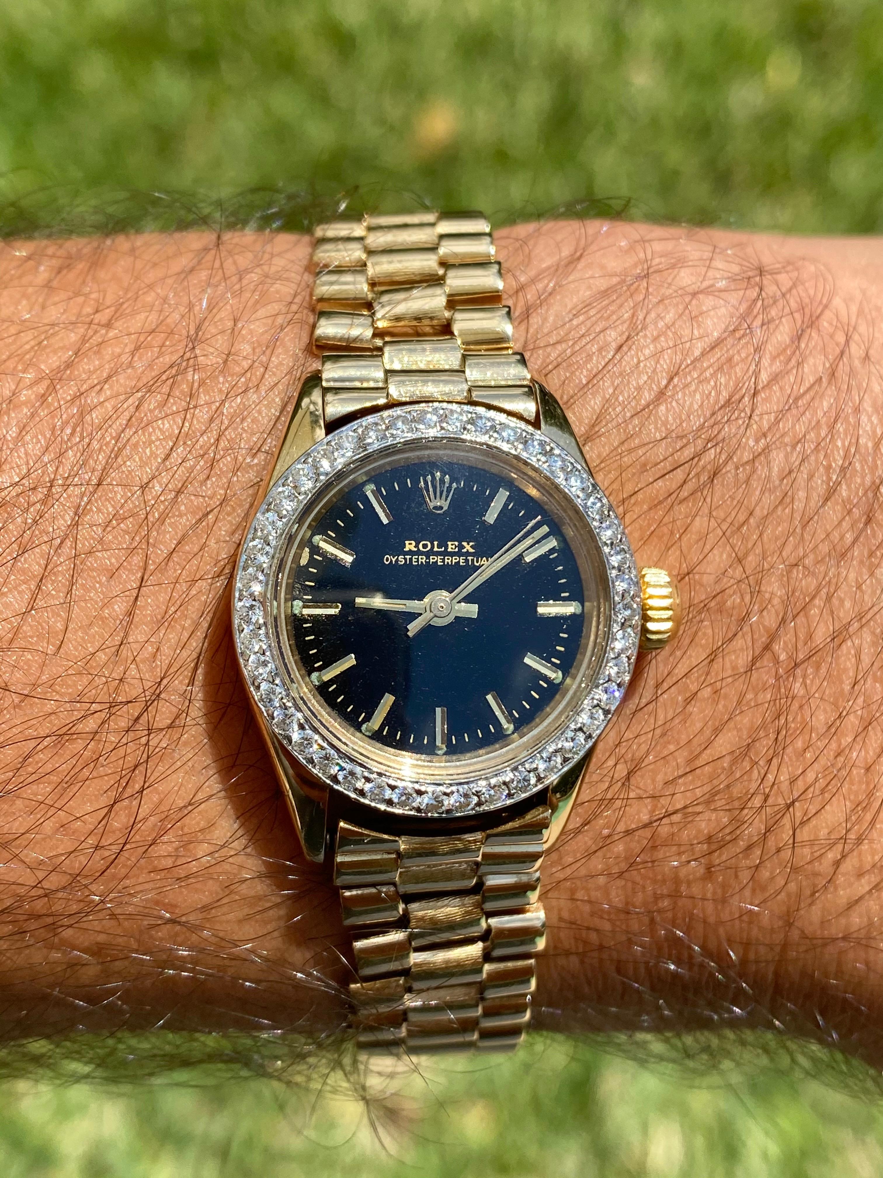 Rolex Oyster Perpetual Black Face/Diamond Bezel Rolex in 18k Yellow Gold In Excellent Condition In Miami, FL