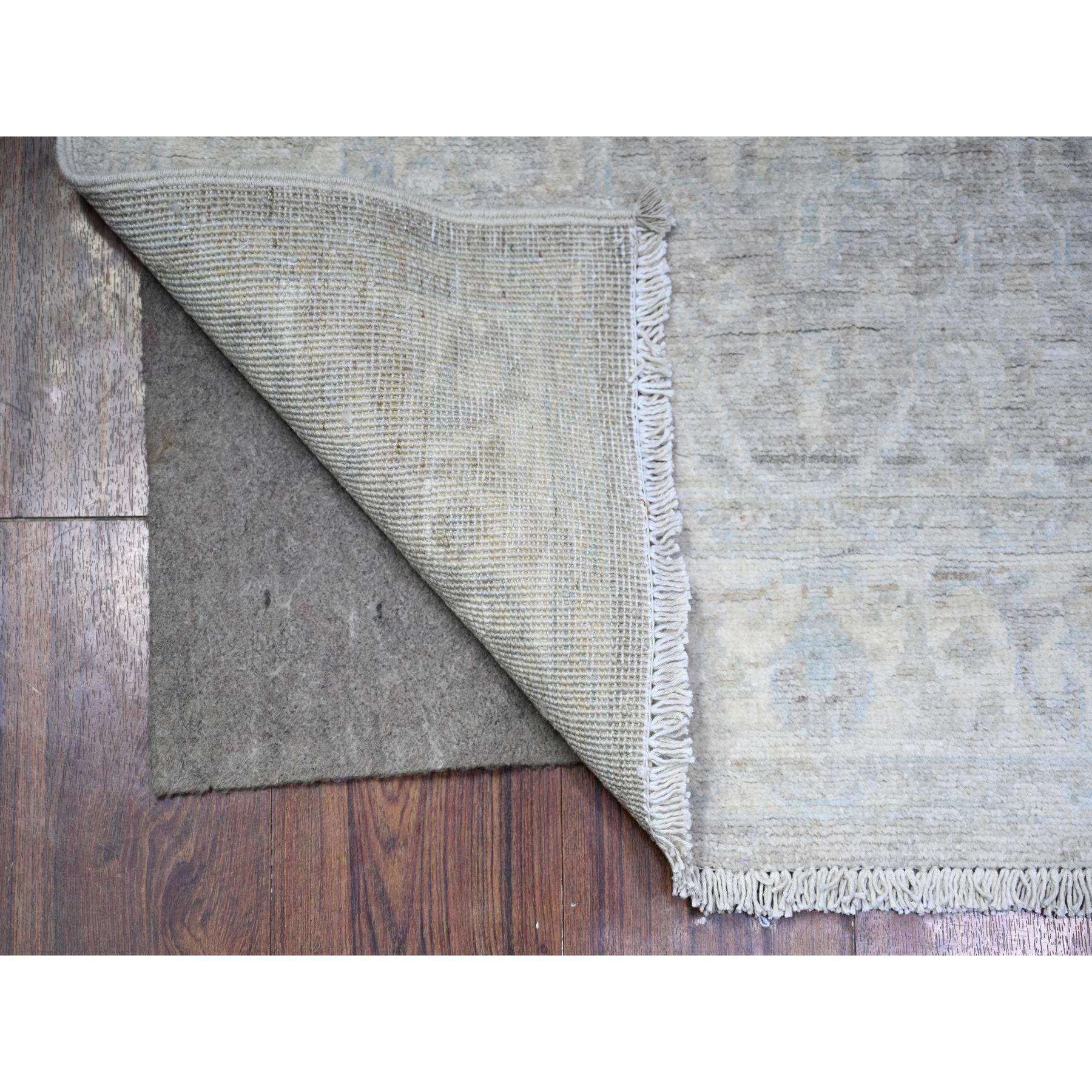 Cloud Gray, Soft Wool, White Wash Peshawar, Hand Knotted, Natural Dyes, Runner Oriental Rug
Primary materials: Wool
Latex: No Pile 
height: 0.25 Inches
Style: Transitional
Primary color: Grey
Secondary colors: Blue, White
Pattern: Oriental