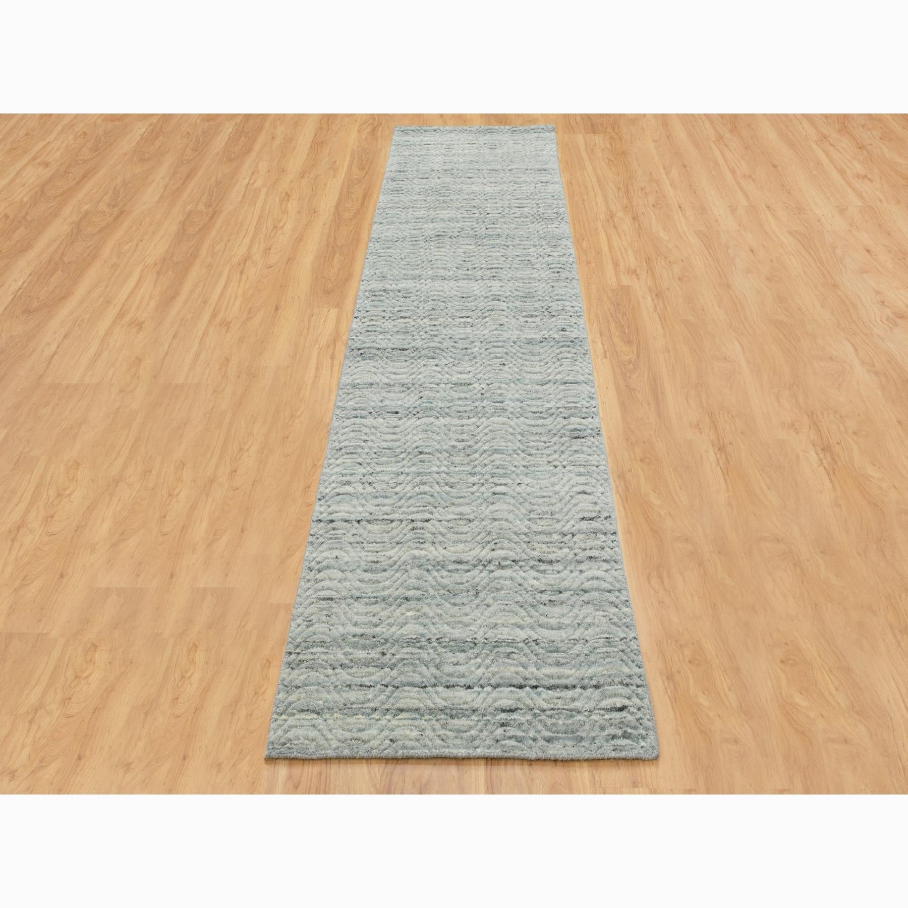 This is a truly genuine one-of-a-kind Green Organic Wool Variegated Textured Design Runner Hand Loomed Modern Oriental Rug. It has been woven for months and months in the centuries-old Persian weaving craftsmanship techniques by expert