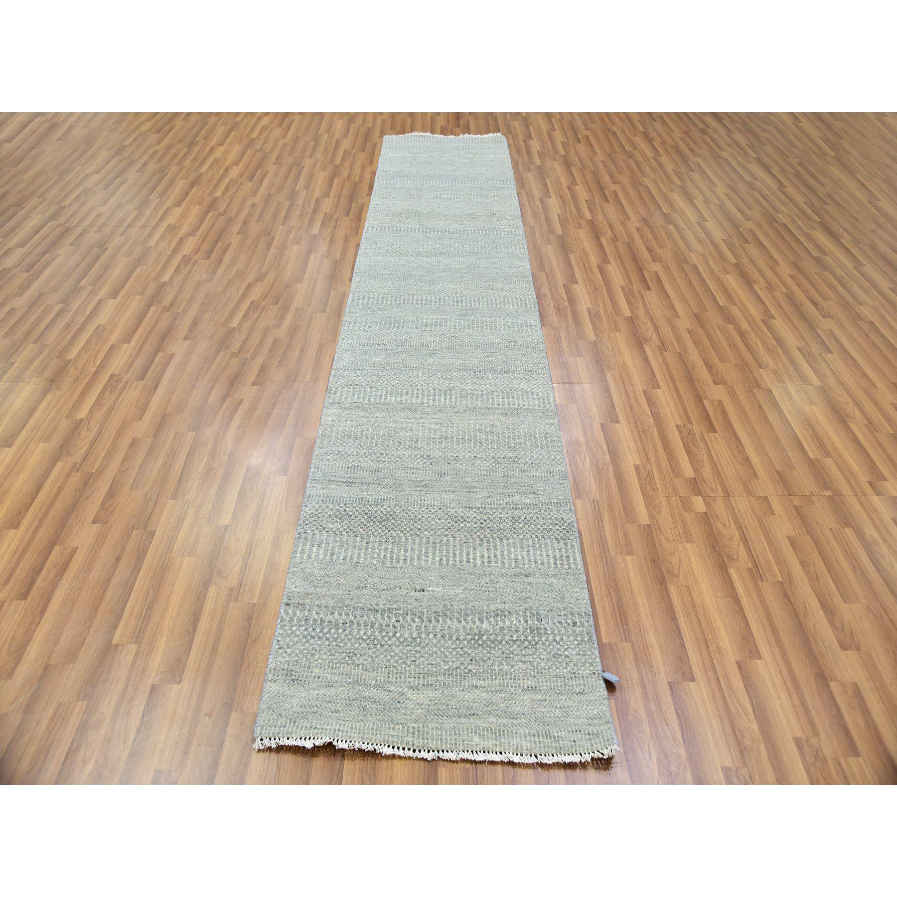 This is a truly genuine one-of-a-kind Undyed Pure Wool, Tone on Tone, Modern Grass Design, Hand Knotted, Oriental Rug. It has been Knotted for months and months in the centuries-old weaving craftsmanship techniques by artisans.
Primary materials: