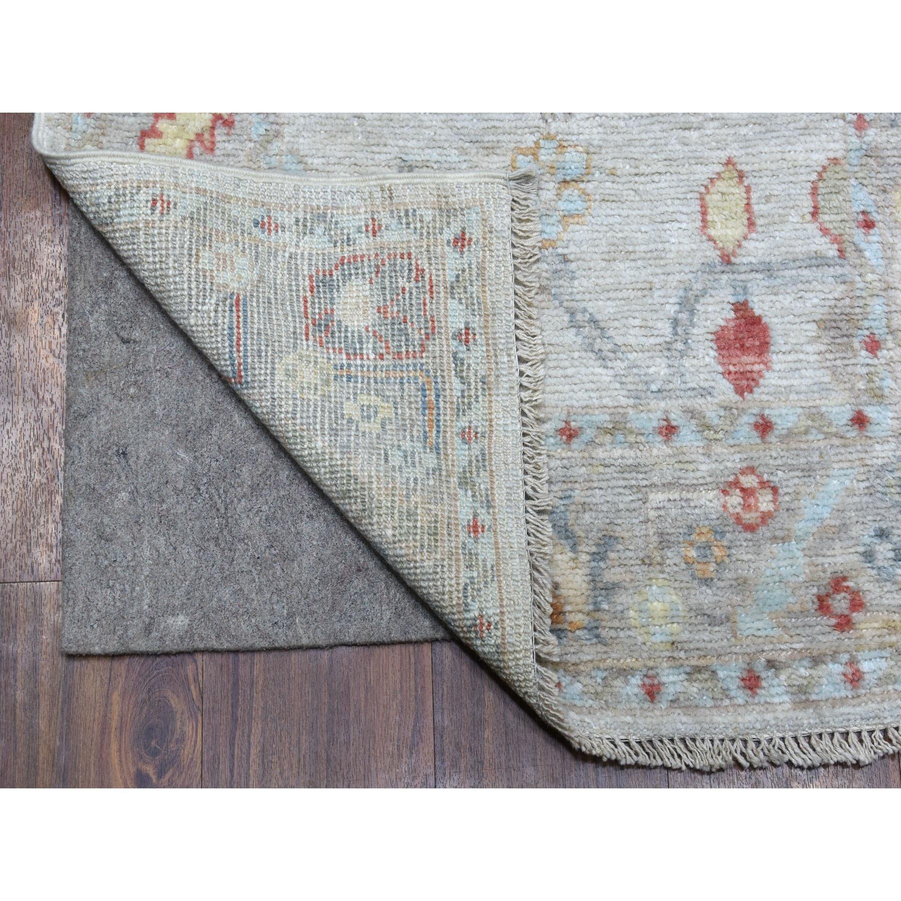 This is a truly genuine one-of-a-kind Soft Velvety Wool Hand Knotted Gray Angora Oushak Oriental Runner Rug. It has been Knotted for months and months in the centuries-old weaving craftsmanship techniques by expert artisans.
Primary materials: