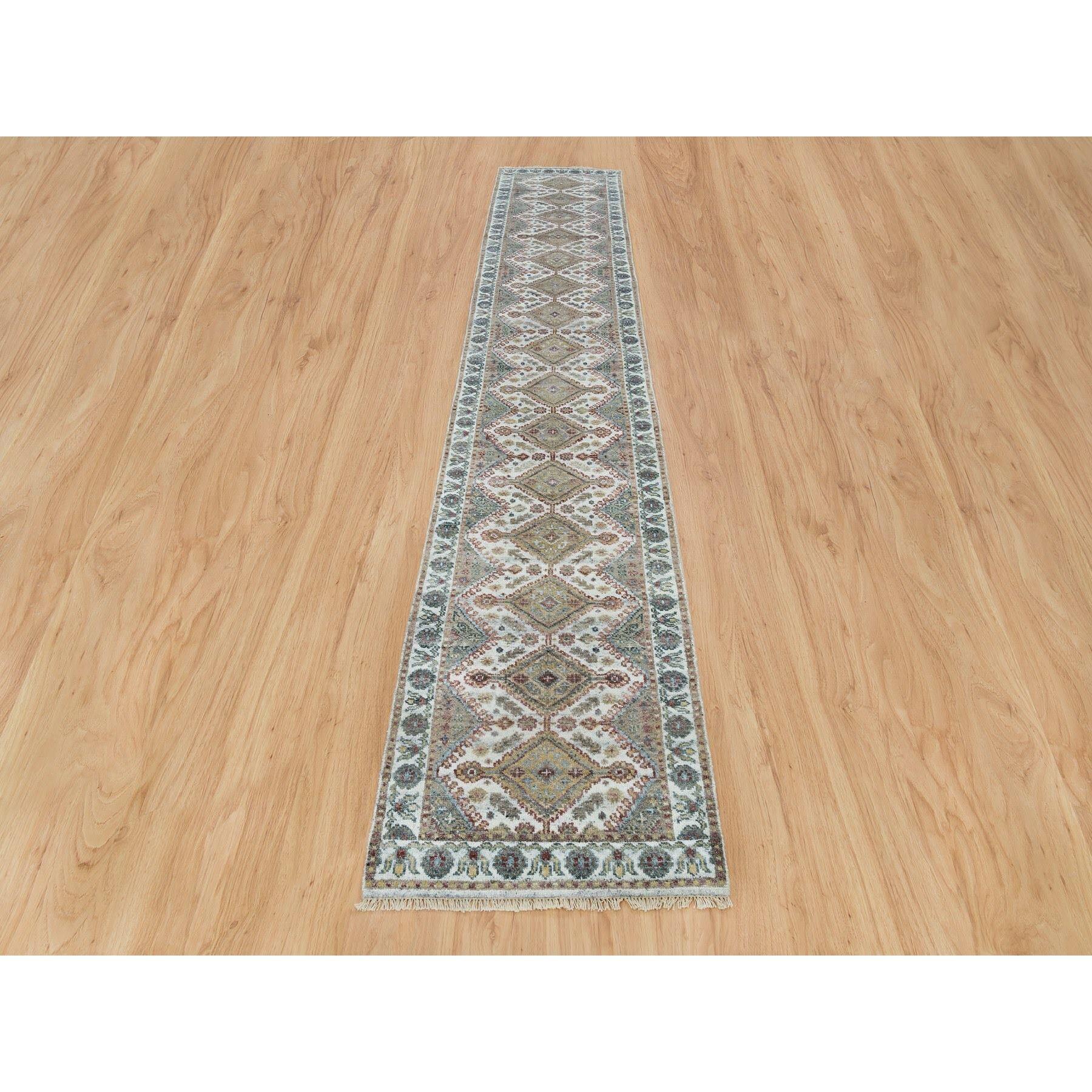 This is a truly genuine one-of-a-kind Hand Knotted Shiraz Reimagined Unique Flower Rosettes Border Design, Oriental Rug. It has been Knotted for months and months in the centuries-old weaving craftsmanship techniques by expert artisans.
Primary