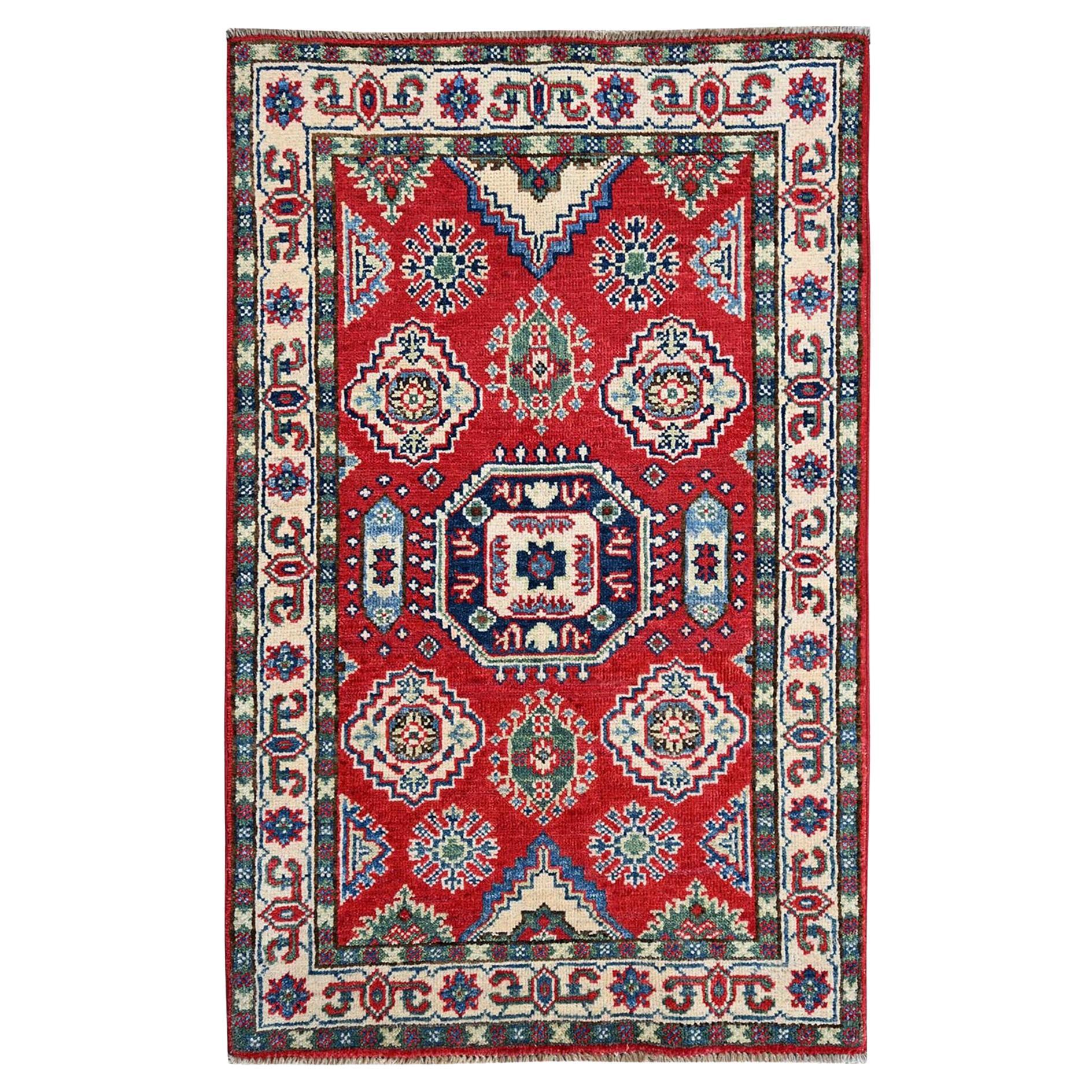 2
6"x4
 Red Kazak with All Over Tribal Motifs Hand Knotted Soft Wool Mat Rug For Sale