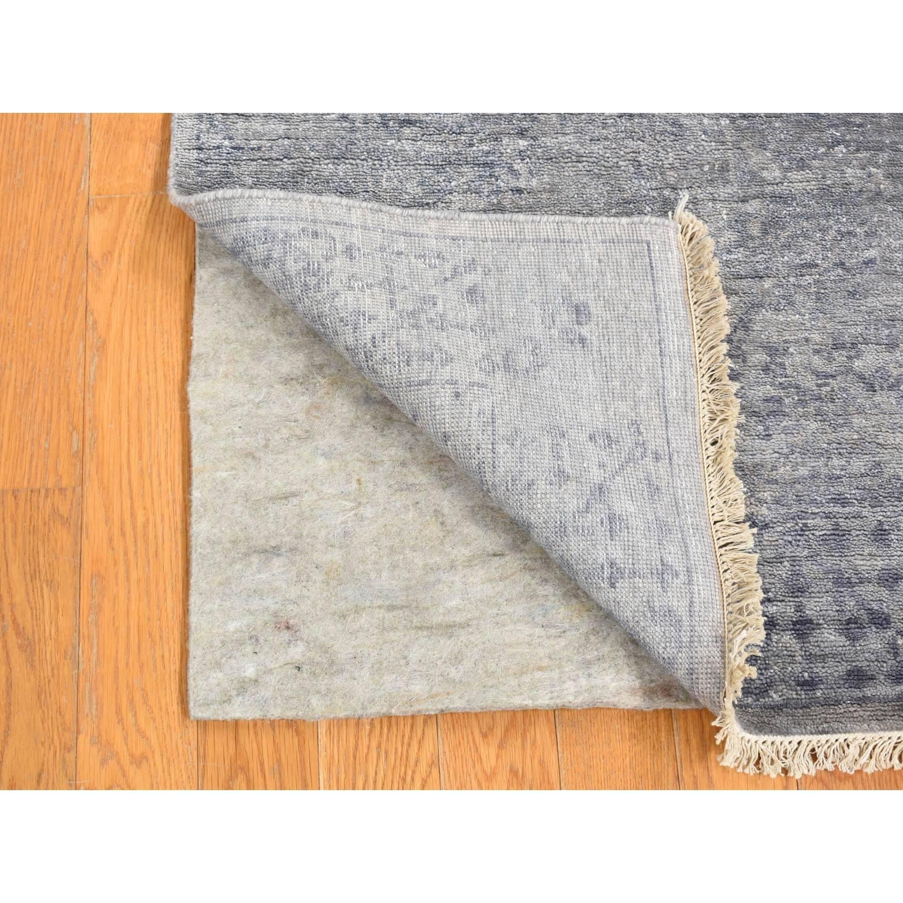 Goose Gray, Broken Persian Design Tone on Tone, Silken Plant Base Silk Hand Knotted, Short Runner Oriental Rug
Primary materials: Silk
Latex: No Pile  
height: 0.25 Inches
Style: Transitional
Primary color: Grey
Secondary colors: Blue
Pattern:
