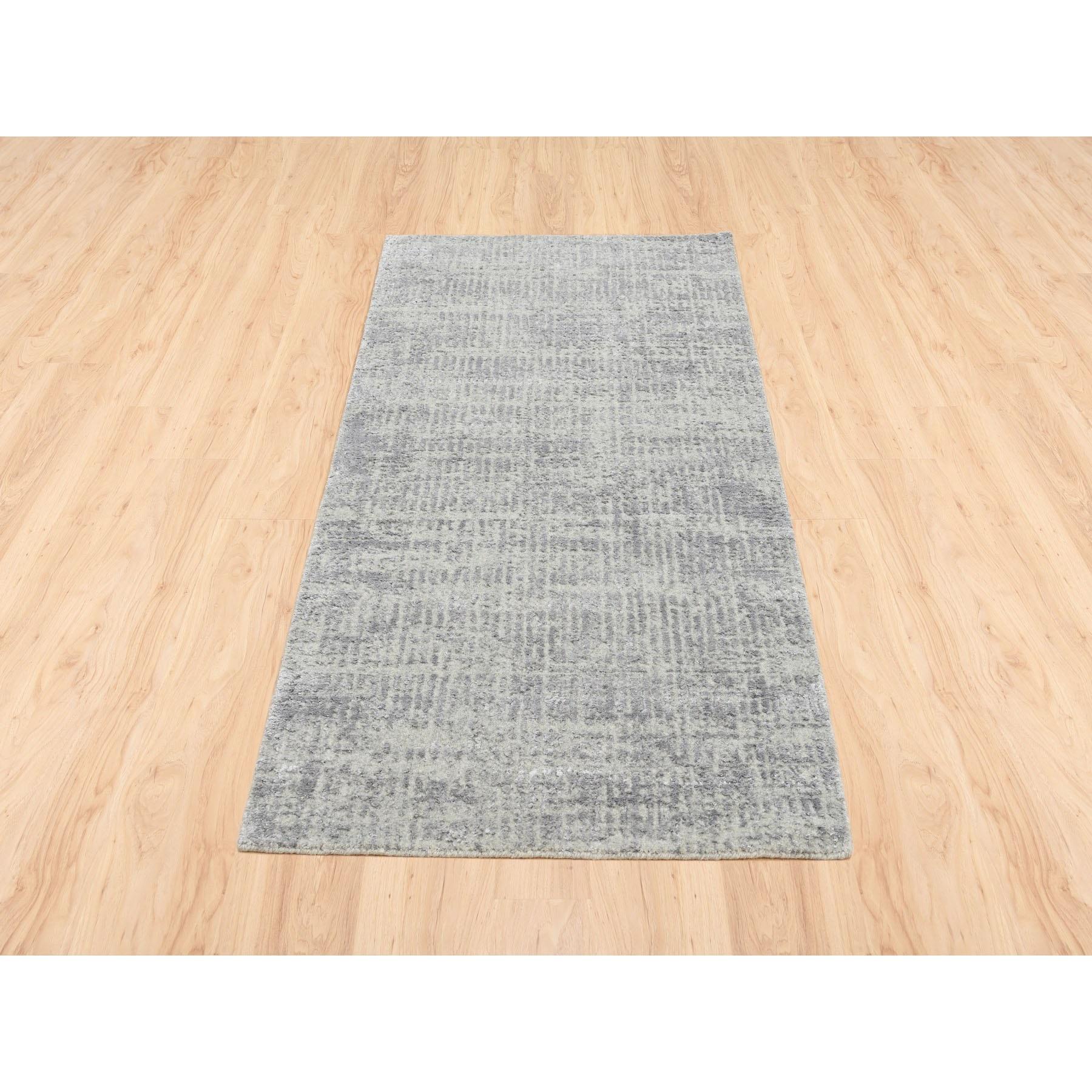 This is a truly genuine one-of-a-kind Hand-Loomed Gray Fine Jacquard Modern Wool and Silk Oriental Runner Rug. It has been Loomed for months and months in the centuries-old weaving craftsmanship techniques by expert artisans.
Primary materials: Wool
