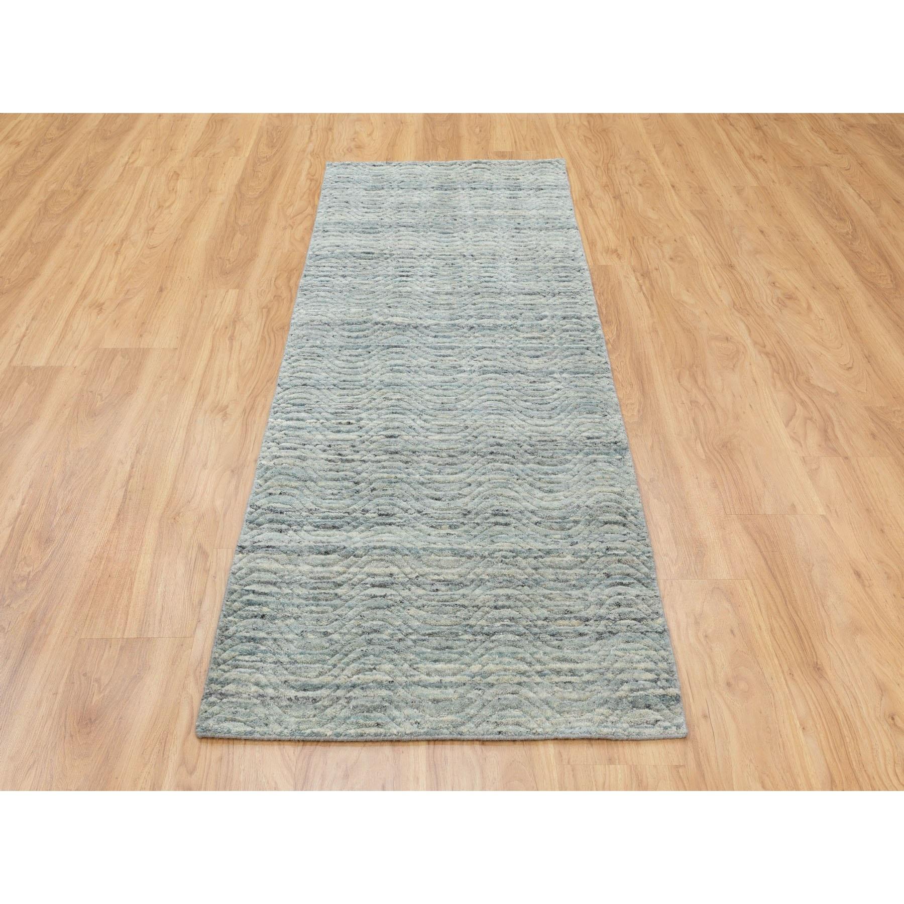 This is a truly genuine one-of-a-kind Green Variegated Textured Design Hand Loomed Pure Wool Modern Runner Oriental Rug. It has been woven for months and months in the centuries-old Persian weaving craftsmanship techniques by expert