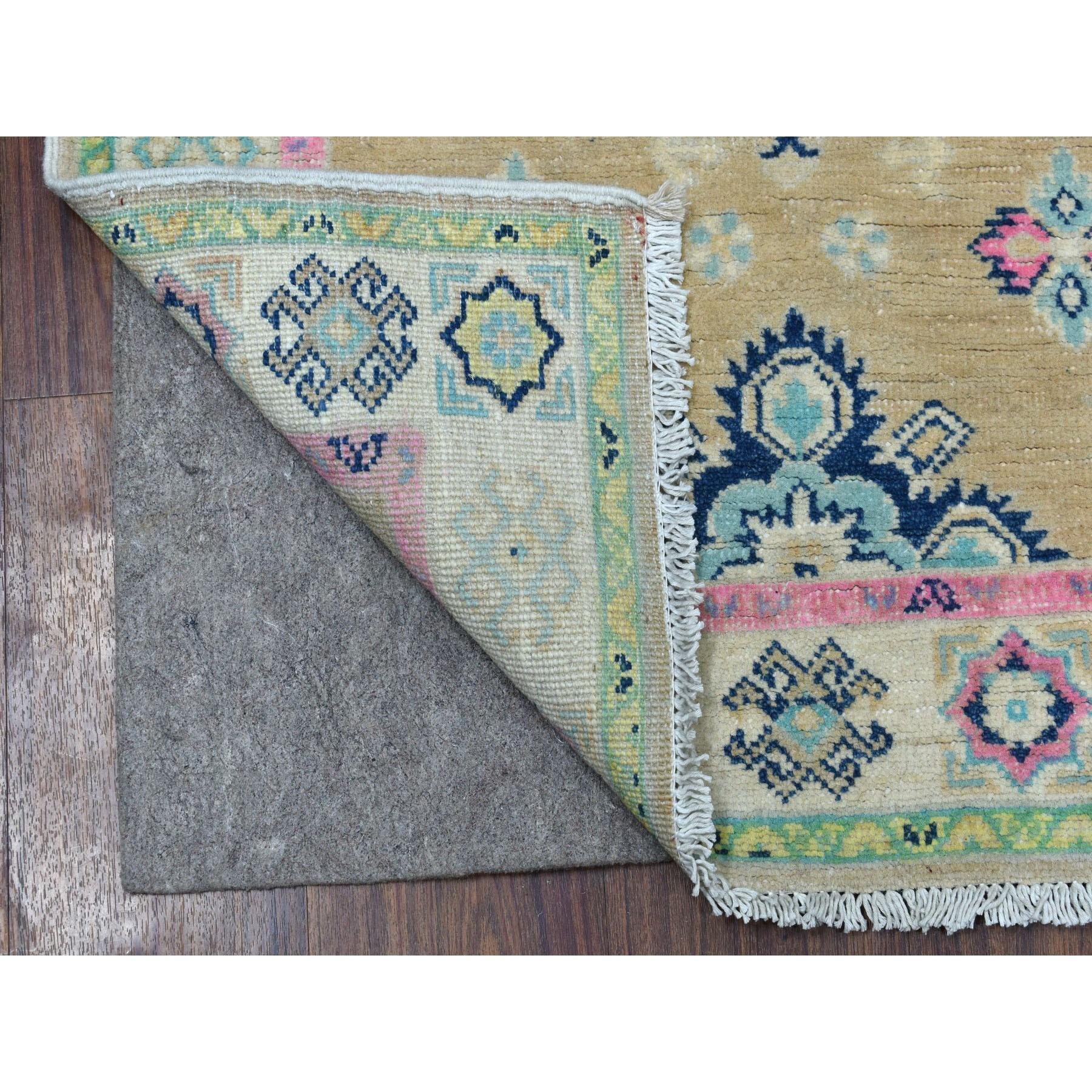 This is a truly genuine one-of-a-kind Gray Fusion Kazak Pure Wool Hand Knotted Runner Oriental Rug. It has been woven for months and months in the centuries-old Persian weaving craftsmanship techniques by expert artisans.
Primary materials: