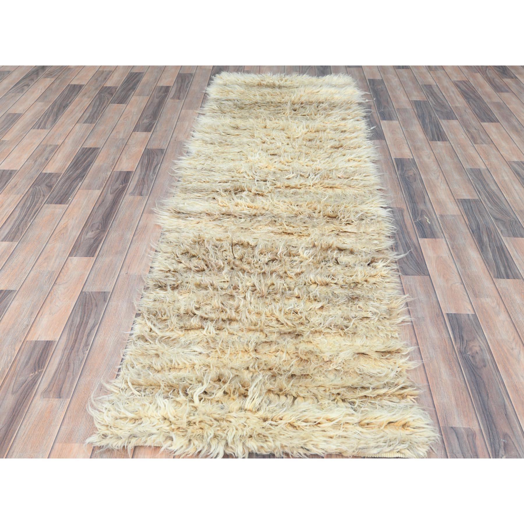 Linen Ivory, Ben Ourain Moroccan Berber Shilhah Design, Natural Dyes, Natural Wool, Hand Knotted, Runner Oriental Rug
Primary materials: Wool
Latex: No Pile 
height: 0.25 Inches
Style: Traditional
Primary color: Ivory
Secondary colors: Brown, Black,