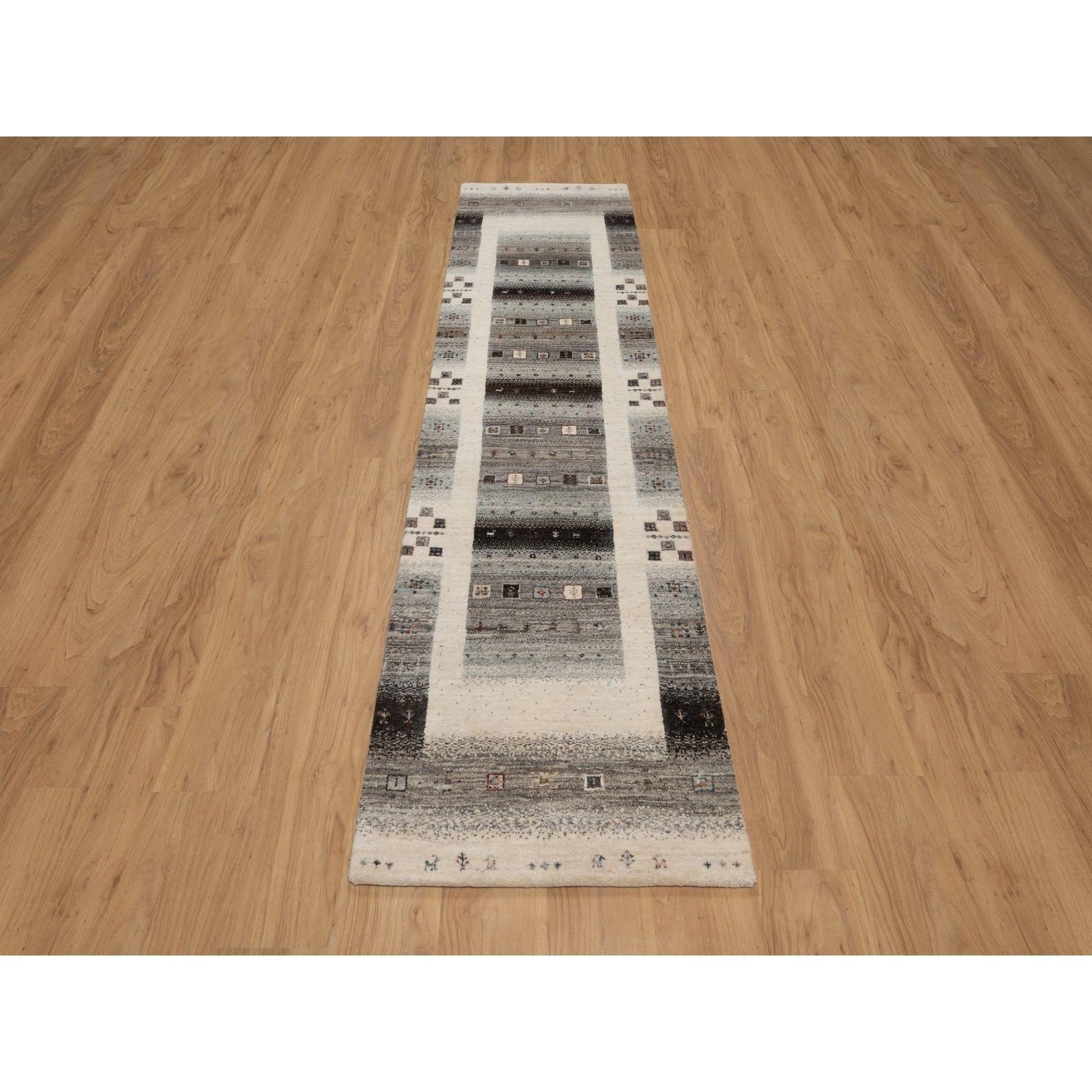 Photon White, Hand Knotted, Thick and Plush, Modern, Lori Buft Gabbeh with Small Animal and Human Figurines, Pure Wool, Runner, Oriental Rug
Primary materials: Wool
Latex: No Pile 
height: 0.25 Inches
Style: Contemporary
Primary color: