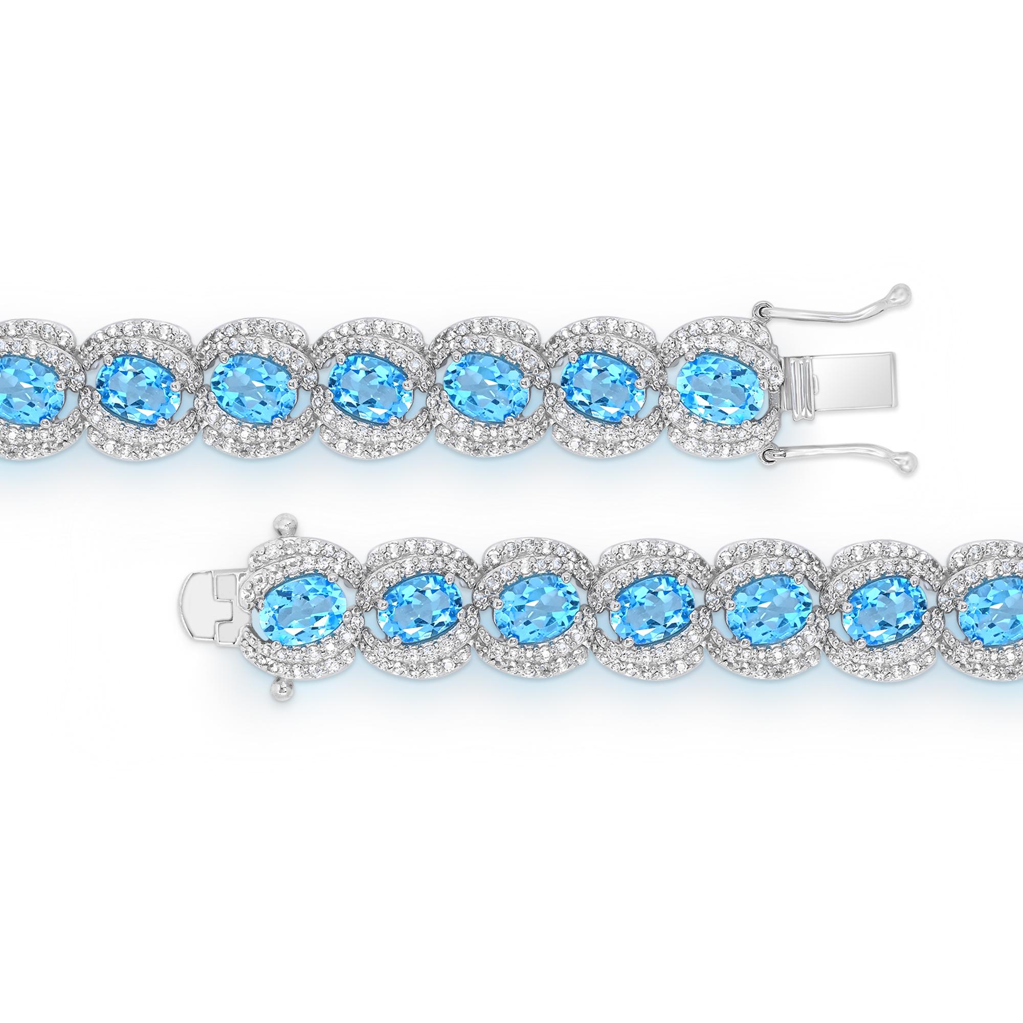Contemporary 27-1/3 Carat Oval Swiss Blue Topaz and White Topaz Bracelet in Sterling Silver For Sale
