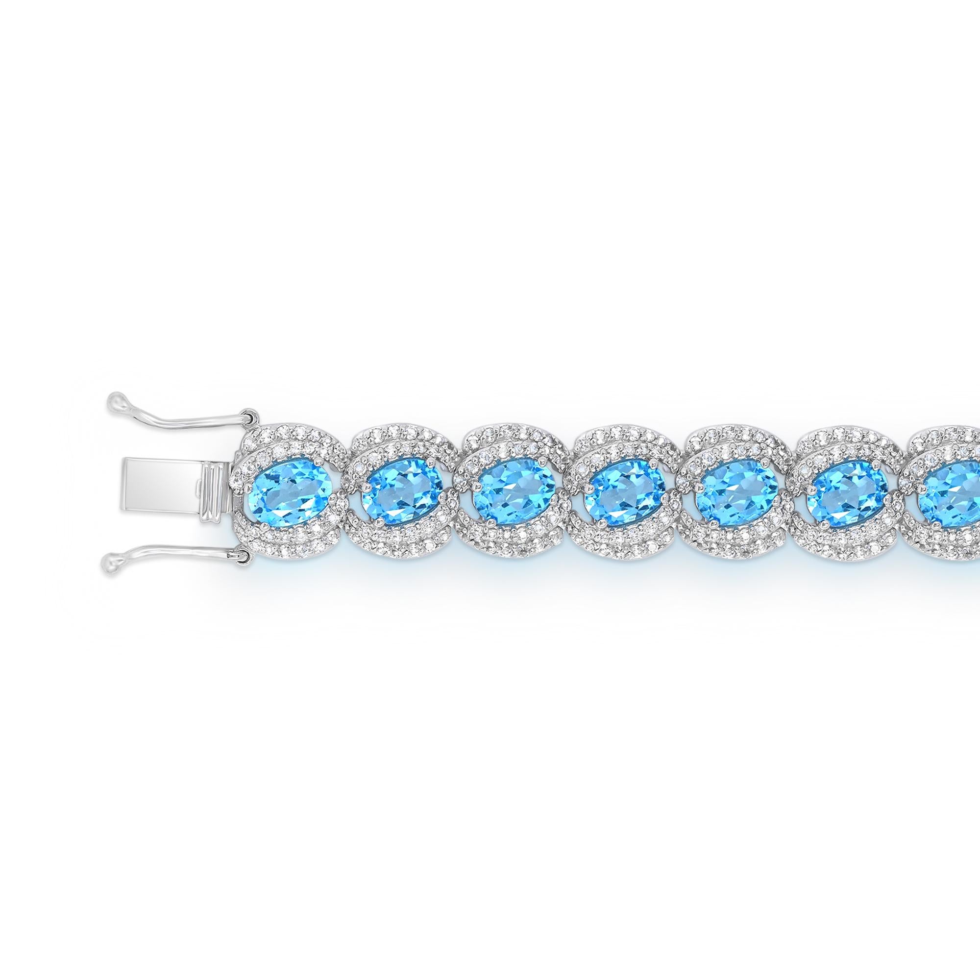 Oval Cut 27-1/3 Carat Oval Swiss Blue Topaz and White Topaz Bracelet in Sterling Silver For Sale