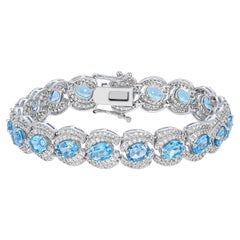 27-1/3 Carat Oval Swiss Blue Topaz and White Topaz Bracelet in Sterling Silver