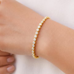 Bracciale con diamanti SI/H da 2,7 carati con castone in oro giallo 18 carati