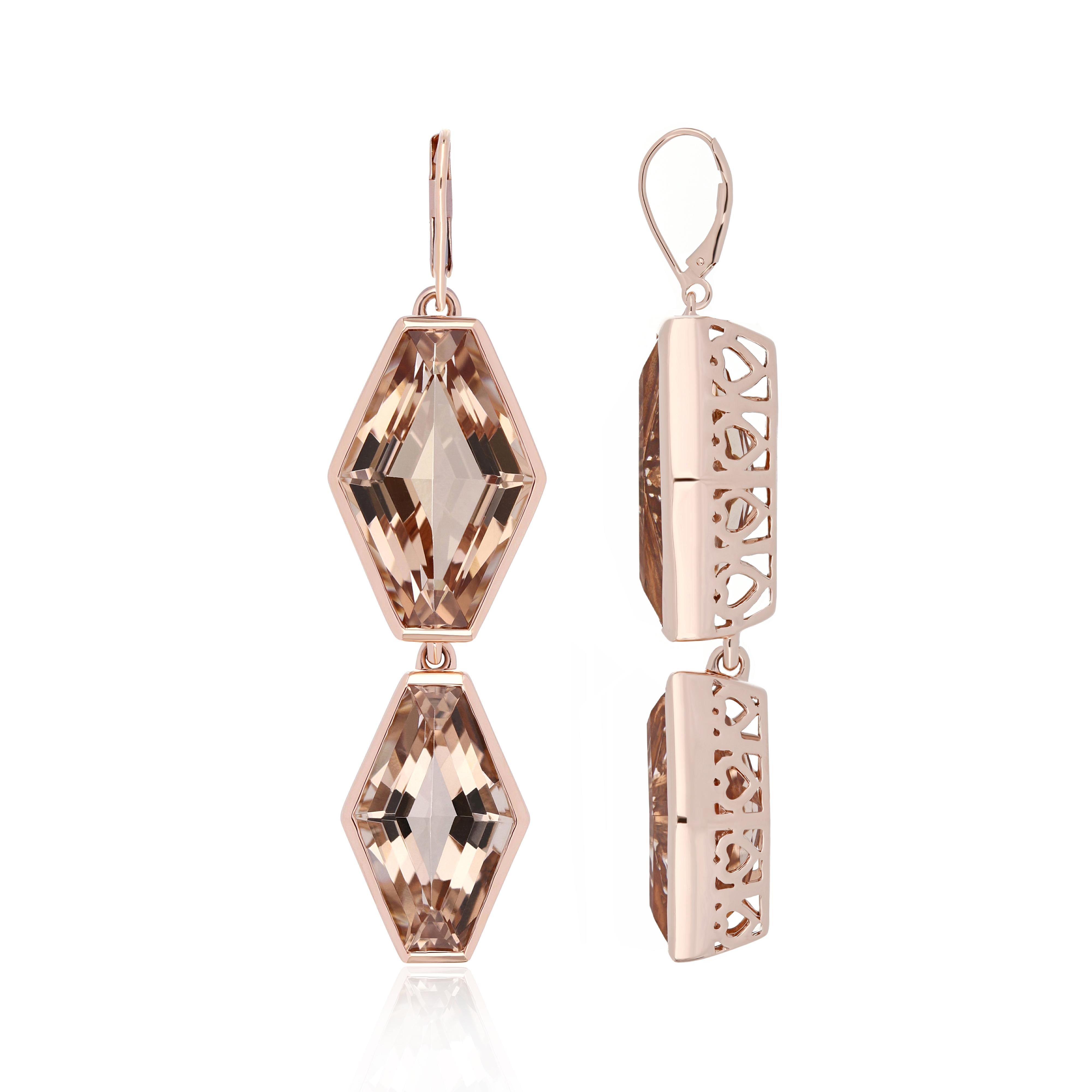 Elegant and exquisitely detailed Cocktail 14K dangle Earrings, center set with exclusively hand cut 27.44 Cts. (approx.) Fancy Hexagon Morganite.  Beautifully Hand crafted in 14 Karat Rose Gold.

Stone Size:
Morganite: 16 x 10 mm, 18x12 mm

Gemstone