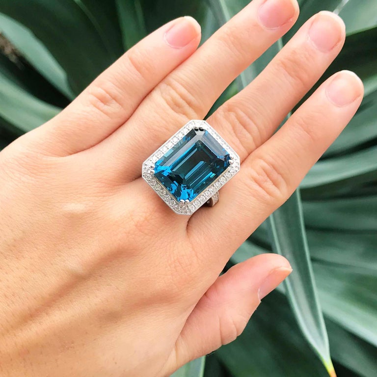 27 Carat Topaz And Diamond Halo Ring 14k White Gold Emerald Royal Ocean Blue Color For Sale At 1stdibs The cold war era story concerns an alleged plot between the russians and cubans. 27 carat topaz diamond halo ring 14k white gold emerald royal ocean blue color