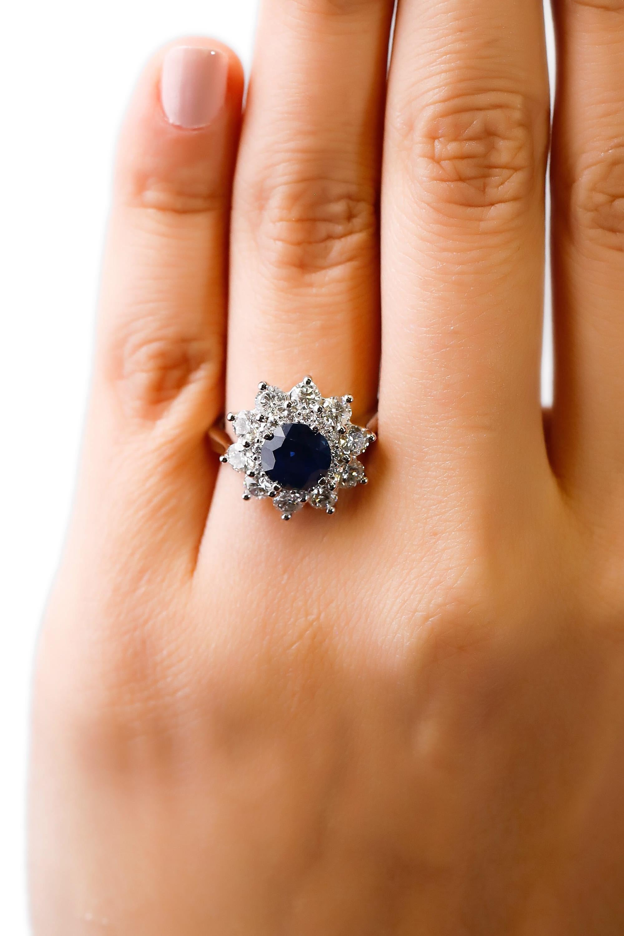 Romantic 2.7 Carat Round Blue Sapphire 1.9 Carat Diamond 14 Karat Gold Floral Halo Ring For Sale