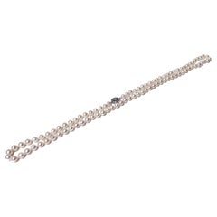 27 inch strand Cultured Pearls 18K Diamond enhancer