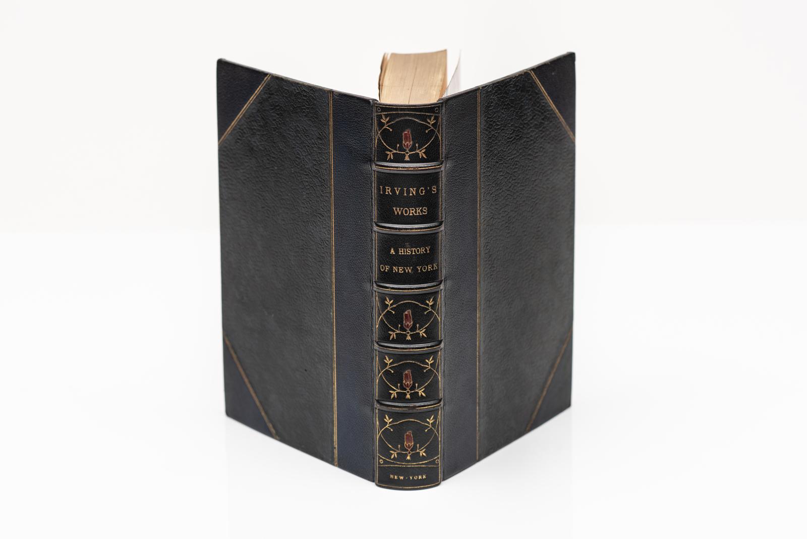 27 Volumes. Washington Irving, The Works. Hudson Edition. Bound in 3/4 blue morocco with marbled morocco boards. Gilt tooling on the covers and raised band spine. Top edges gilt. Marbled endpapers. Portrait frontispiece. New York & London: G.P.
