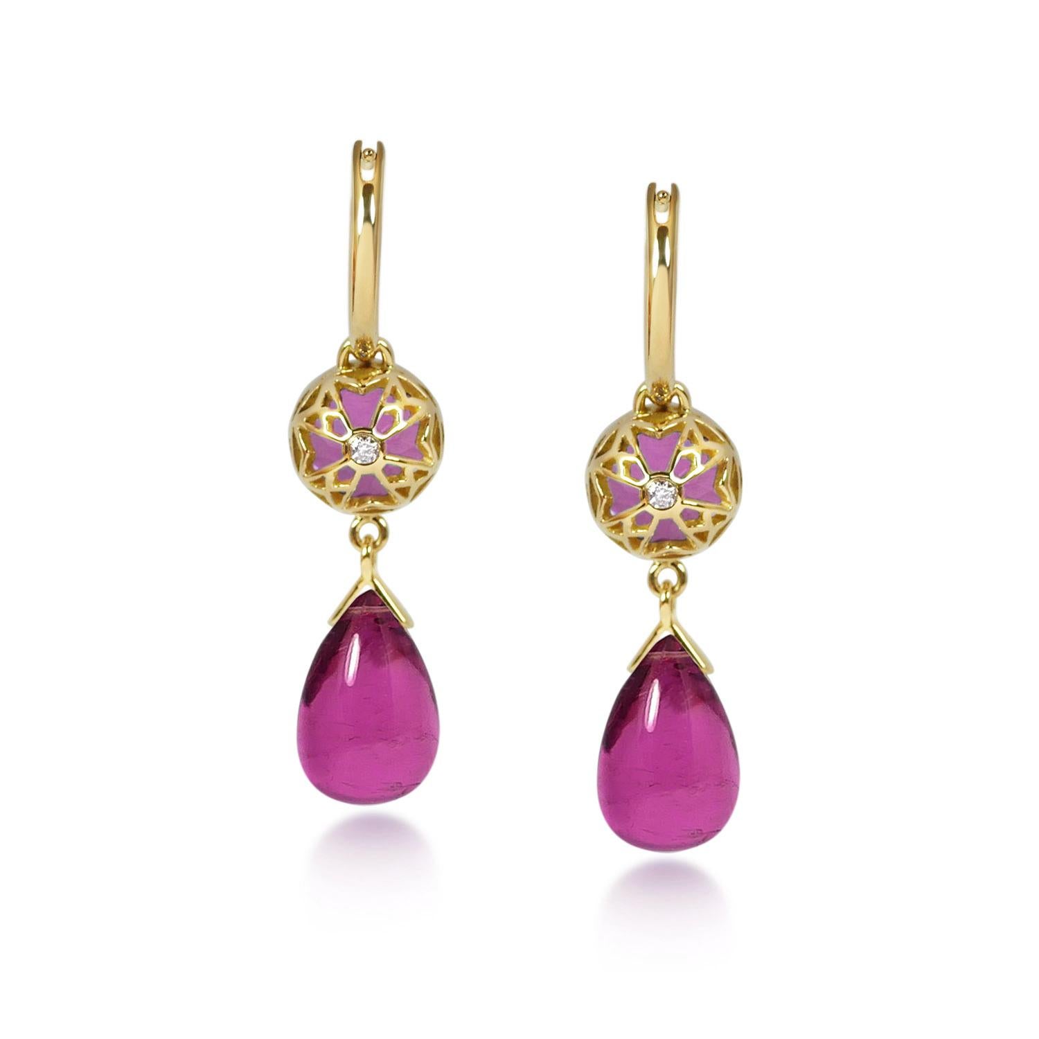 Handcrafted 2.60 & 7.10 Carats Pink Tourmalines 18 Karat Yellow Gold Drop Earrings. Dancing drops carved in Pink Tourmaline under a set of 8mm round cut Pink Tourmaline stones encased in our iconic hand pierced gold lace to let the light through. A
