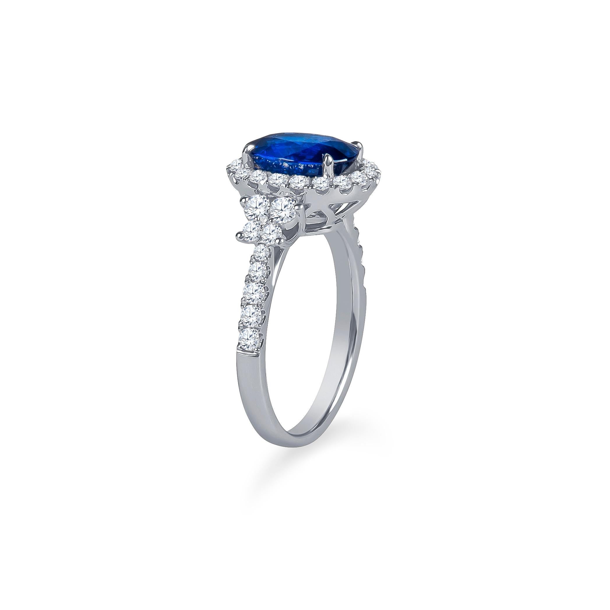 Oval Cut 2.70 Carat (AGL)Natural Blue Sapphire, 0.84 total weight Diamonds in 18kw Ring