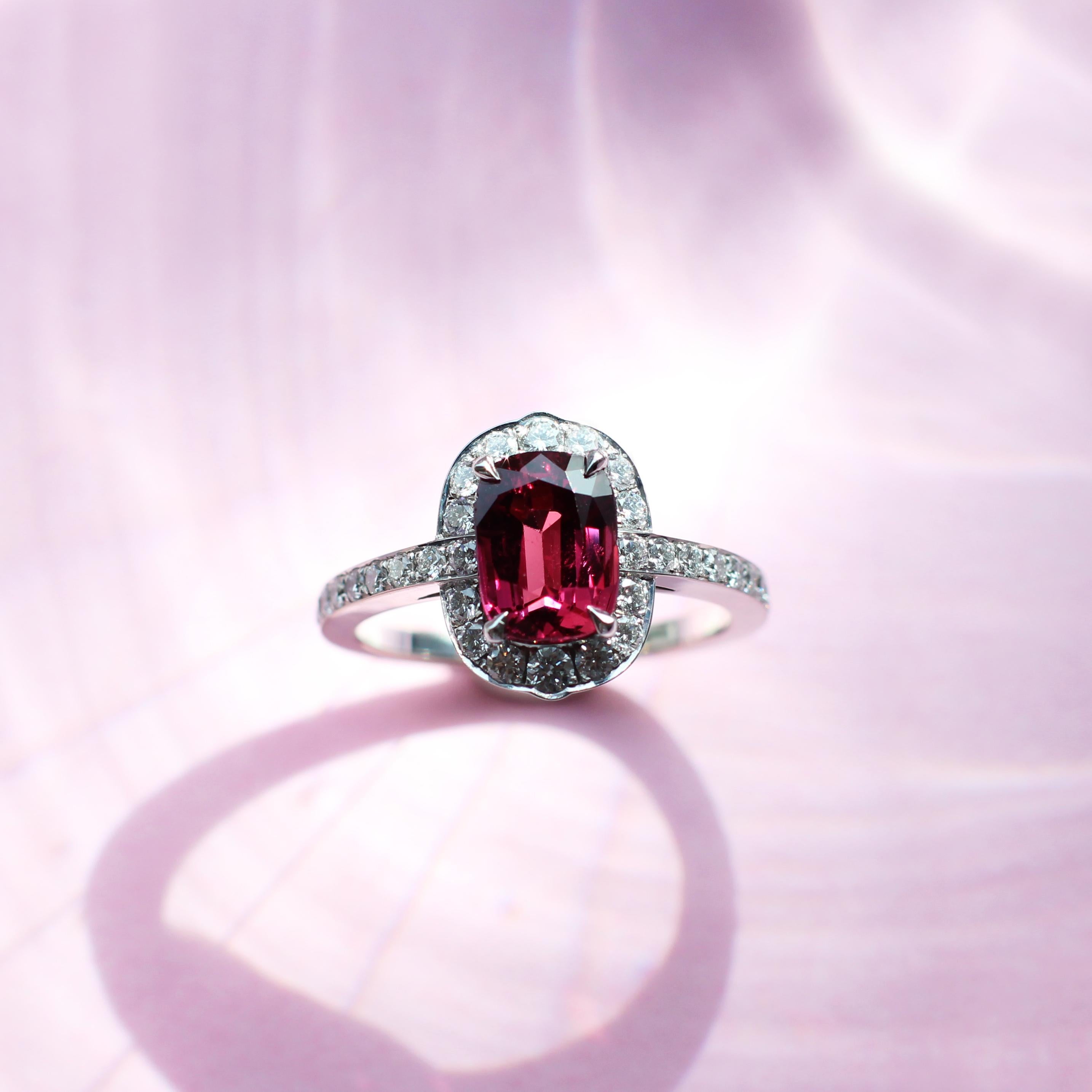 Contemporary 2.70 Carats Deep Red Ruby and White Diamond Halo Ring For Sale