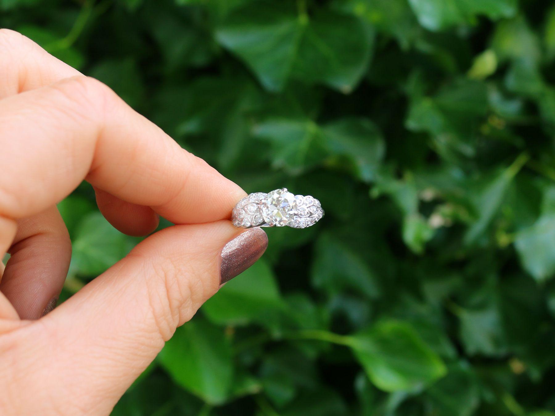 A stunning antique 2.70 carat diamond and vintage 15 karat white gold, platinum set twist style dress ring; part of our diverse diamond estate jewelry collections.

This stunning, fine and impressive 2.70 carat diamond ring has been crafted in 15k